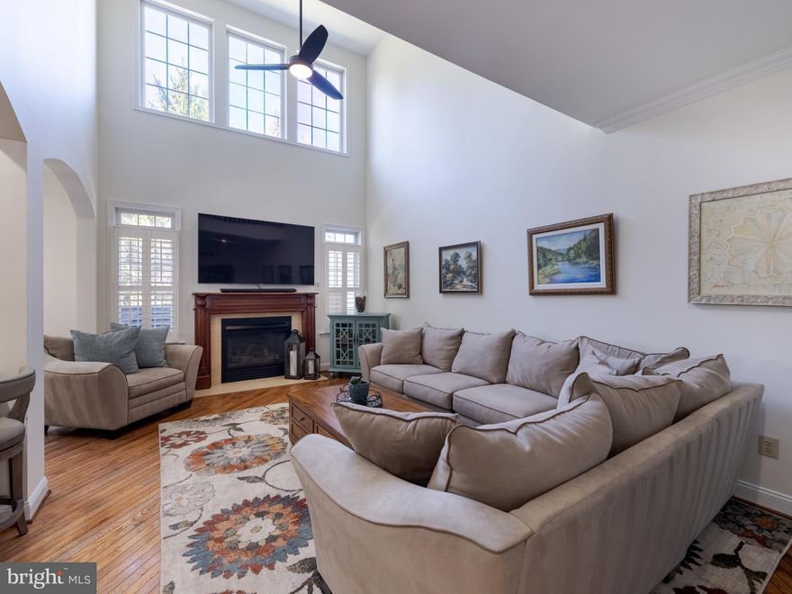 Welcome home to this pristine, move-in ready condo-townhome located in Greycliffe at Lower Gwynedd Township. An exceptional spacious home with more than 2900 square feet of living and entertaining space on 3 finished levels which have recently been renovated and updated by the present owners.  Architectural details include high ceilings, decorative pillars, crown molding, elegant dining room chandelier, high end light fixtures, arched doorways, stunning diagonal hardwood floors, chair rail, recessed lighting, plantation shutters and more. Enter this home to an open concept living and dining room. The dining room leads into an expansive family room with soaring ceiling, inviting gas fireplace with custom wood mantle. The upper family room windows are treated with invisible protective sun reflective film for maximum comfort and temperature control. Separating the family room from the kitchen is a granite counter height breakfast bar. Entering the kitchen you will find an abundance of custom designed cabinetry, newer stainless steel smart gas range/oven and dishwasher as well as a side by side refrigerator and built in microwave. Completing the kitchen is an intimate dining area which leads out through sliding glass doors to a Trex deck. A retractable awning creates a private oasis for outdoor living. An updated powder room, coat closet, entry to 1 car garage and lower and upper levels can also be found on the first floor. The garage is equipped with a utility sink, cabinetry for storage and hooks to organize tools and miscellaneous items. 
Located on the second level you will find the primary bedroom, second bedroom, laundry room , full bath and spacious loft. Entering the  large primary bedroom you experience a vaulted ceiling with remote controlled ceiling fan, two large walk in closets and an en-suite bathroom which includes both a soaking tub and walk in shower. 
The lower level is partially finished and can be used as a multi-purpose room or even a third bedroom. There is a large area for storage and an additional closet on this level. New HVAC 2 zone in 2021 . New hot water heater 2025. Both paver walkway in front and patio out back  were updated 2024. Professional landscaping front and back done by current owners 2024. Located in desirable Wissahickon School District.