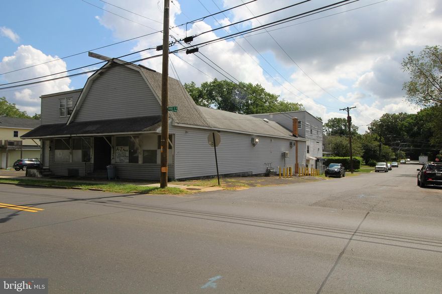 Mixed use opportunity in Morrisville Boro in an excellent location on W Bridge Street. Approximately 5,000sf retail space on first floor, formerly A-Z Music. A total of 4 apartments located on the second floor. 1 - 4 bedroom/1 bath apartment that has been gutted with new electric and plumbing. 1 - 4 bedroom/1 bath apartment and 2 - 1 bedroom/1 bath apartments that have been completely renovated to include new electric, plumbing, flooring, kitchens, etc. The unfinished basement has new plumbing and columns repaired. The building has all new electric service and panels, including 6 meters. 60% of the flat rolled and asphalt roof has been replaced, as well. Oil tank removed and all gas heaters.