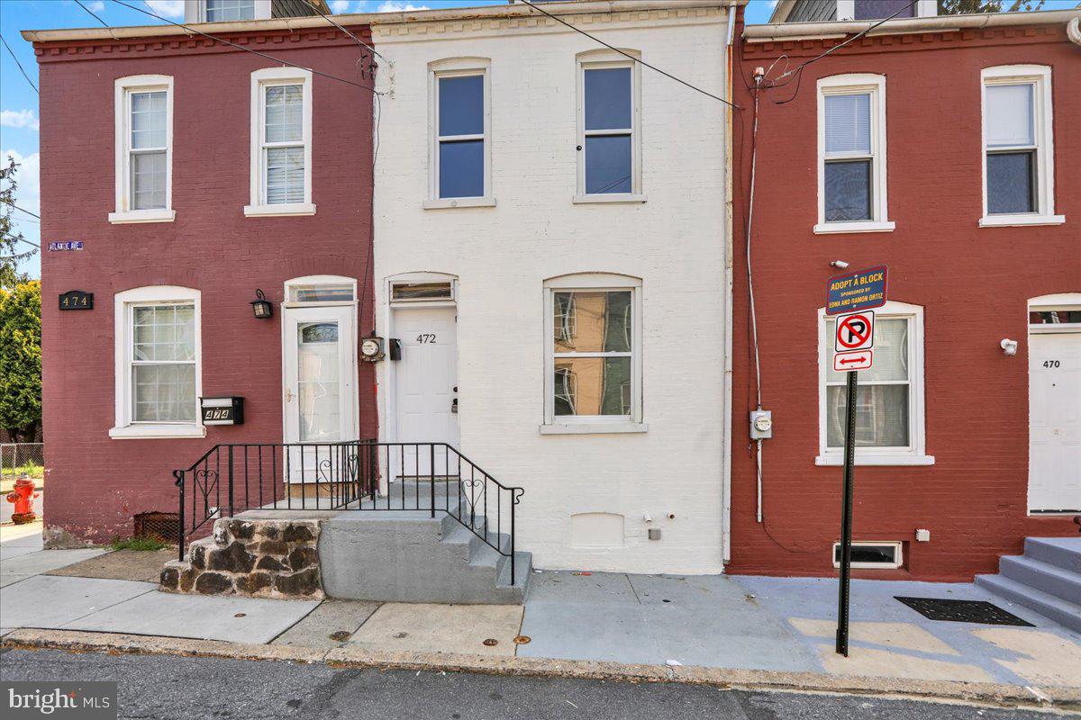 Charming and affordable, this 4-bedroom, 1-bath home at 472 Atlantic Ave. Featuring a spacious living area, an eat-in kitchen, and updated flooring throughout, this home offers comfortable living with room to make it your own. The private backyard is great for relaxing or entertaining, and the full basement provides extra storage or workspace.