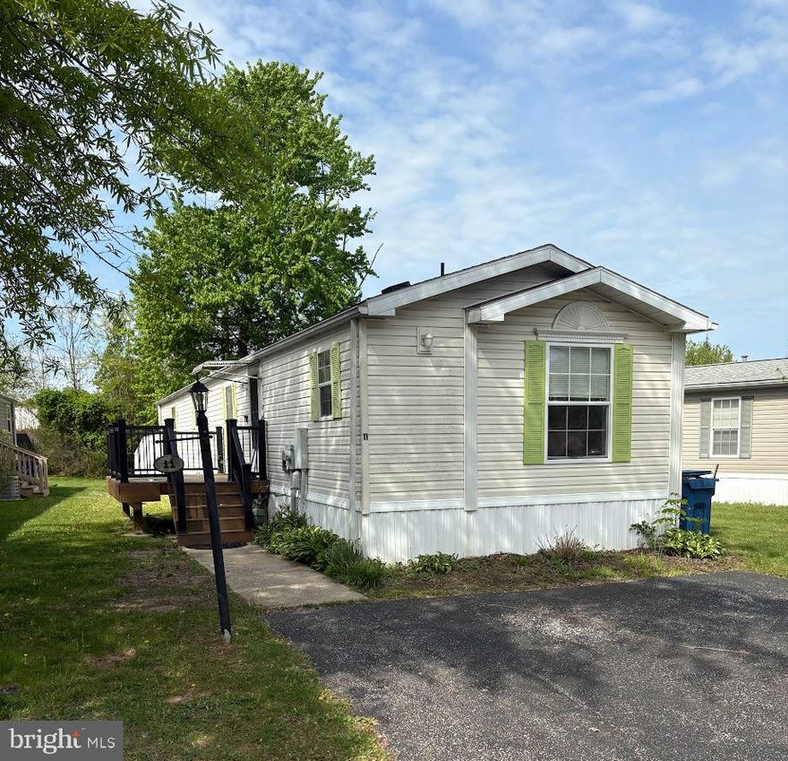 Welcome to this well-maintained and upgraded 2-bedroom, 2-bathroom single-wide home in the sought-after Spring Meadows Community of Schuylkill Township! This spacious model features an open floor plan with 9-ft ceilings, luxury vinyl flooring, a comfortable family room, and an additional living area. The deluxe extended maple kitchen offers updated appliances, an island, ample cabinet space, a breakfast bar, gas range, microwave, dishwasher, and added cabinetry for convenient storage. The dining area flows effortlessly into the main living space, perfect for entertaining. Step outside to enjoy a low-maintenance deck for relaxing or outdoor gatherings.  The private primary suite includes a walk-in closet, soaking tub, and stall shower, while the guest bedroom and full bath are located on the opposite end for added privacy. Additional highlights include deck (2022), central air, oak trim package, added insulation, one-piece fiberglass shower/tubs, cathedral ceilings, and beveled-edge medicine cabinets. The laundry area with washer and dryer is located near the bedrooms for convenience. Outside, you’ll find a large shed for extra storage and mature landscaping that enhances curb appeal. Lot rent includes trash and snow removal (buyer to verify with Sentry Property Management). Pets are allowed! Located just minutes from downtown Phoenixville, shopping, dining, parks, trails, and major commuter routes. Quick settlement available—schedule your showing today!