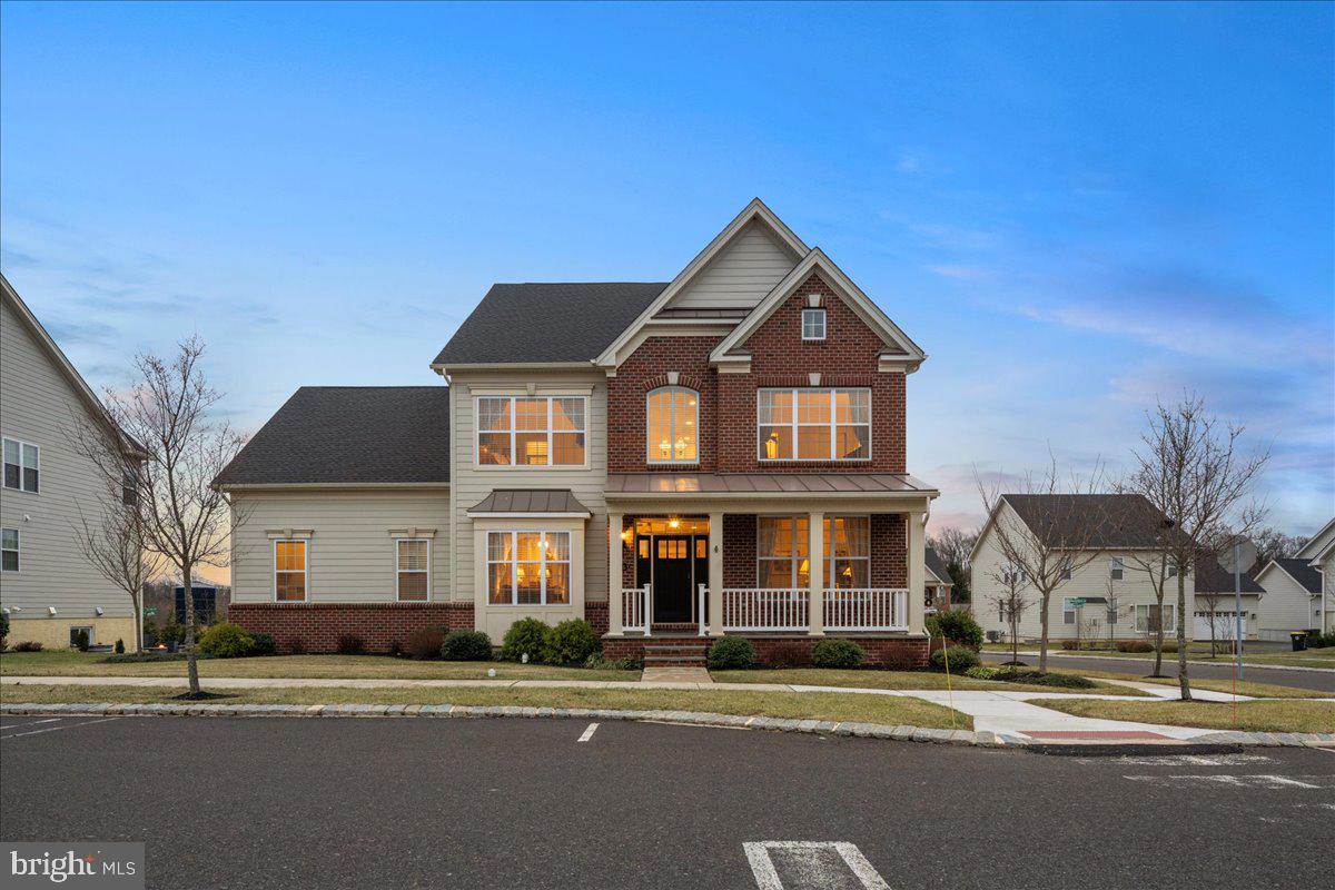 If you are seeking an upscale lifestyle that is maintenance-free and almost new construction, you found it right here on Indigo Drive, just minutes from New Hope and Doylestown. The open-concept floorplan is perfect for entertaining large groups as well as a comfortable space for quiet relaxation.
Welcome to 4863 Indigo Drive, a stately brick-front home with a cozy front porch located in the sought-after Fenton’s Corner community in Buckingham Township.
As you step through the elegant entryway, you are greeted by a grand foyer with gleaming hardwood floors, extensive crown moldings, high ceilings, and a sweeping staircase.
The formal living and dining rooms have stunning crown moldings and lots of natural light. Windows are covered with Hunter Douglas blinds and shades. The heart of this home is the gourmet kitchen, which is sure to delight any culinary enthusiast. A chef will appreciate the Wolf gas range and built-in stainless steel Wolf wall oven, microwave, Bosch dishwasher and Sub-Zero refrigerator.
The countertops in the kitchen, including the backsplash, are top quality granite. The large center island includes a breakfast bar with seating and abundant storage space. All lower cabinets in the kitchen as well as the pantries, have glide-out shelves for easy access. A highlight of this home is a sunroom off the kitchen. Perfect for reading and having a quiet cup of tea. Cozy up in the family room around the beautiful stone hearth and gas fireplace, offering warmth and comfort in cooler months. A first-floor study with glass-paned doors is the perfect retreat after a busy day. There is plenty of storage off the kitchen with a mudroom and an additional pantry closet, located near the first-floor laundry.
Escape upstairs to the luxurious Owners' suite, where tranquility awaits. The spacious bedroom offers a peaceful sanctuary, complemented by tray ceilings and large windows. Pamper yourself in the primary bathroom, featuring a sumptuous soaking tub, a walk-in shower, and dual vanities with upgraded granite tops. A large walk-in closet complete with custom built-ins provides ample storage space for your wardrobe and accessories.
Family members and guests will be right at home in the two additional bedrooms, joined by a Jack n Jill bathroom, and a fourth bedroom with a convenient ensuite bathroom.
There is a bonus room accessed via the back staircase that can be used as an extra family room, office, or workout room. The partially finished lower level offers additional living space for entertaining and for a home gym or crafting area.
Venture outside to the Trex deck for grilling and walk down to the lovely E.P. Henry stone patio with privacy trees for enjoying the sunshine and listening to the birds. You’ll appreciate the Kohler whole house generator when you need one, as well as the backup sump pump, water softener, and carbon filtration system.
This maintenance-free community includes lawn cutting, trimming and mulching in front of your home, snow removal from all sidewalks, stairs, and driveways! A community spirit abounds with Fenton’s Fridays under the gazebo where neighbors gather to socialize on a monthly basis. Ask the listing agent for the extensive list of upgrades to this home.
This home is located in the Blue Ribbon Central Bucks School District. Just minutes from Doylestown Borough, Peddler’s Village, and New Hope. Commuters will appreciate the quick drive to New Jersey too. Enjoy the many nearby parks for dog walking and playgrounds for kids and grandchildren. Schedule your private viewing of this exquisite home today!