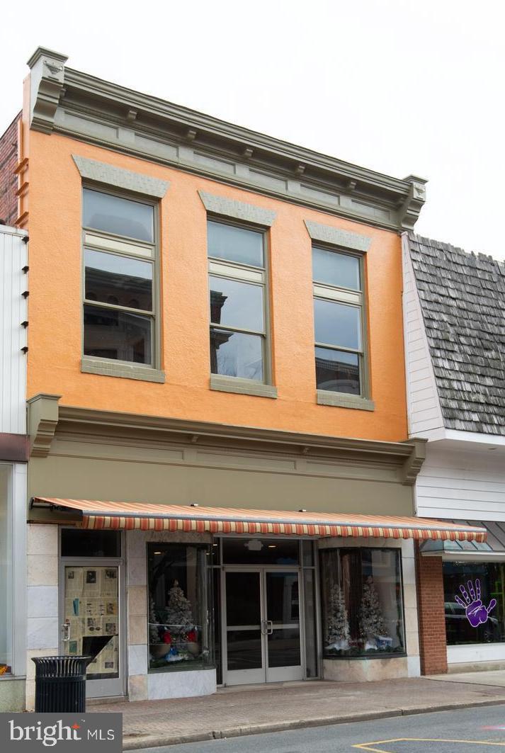 Front first floor space of 440 Race St. Completely remodeled - two showcase windows - 1 bath, office space & storage area. High speed internet available. Great curb appeal. Exposed brick wall, wood floors, recessed lighting, and alarm system.