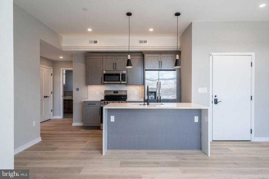 CURRENTLY OFFERING TWO MONTH'S RENT FREE FOR LEASES BEGINNING IN JANUARY 2025 AND EXTENDING TO SPRING/SUMMER 2026


Welcome to Innovator Village, nestled in the heart of Graduate Hospital! This gated community is home to 82 brand new construction, luxury units featuring top of the line finishes. 2401 Washington Ave offers everything you could desire in a city apartment and can be moved into as soon as May 1st. This unit features a spacious, open living room with huge south-facing windows and lovely natural light, a kitchen with quartz countertops and stainless steel appliances, three large bedrooms, two beautiful bathrooms, hardwood floors and an in unit washer/dryer. The unit has a private balcony, perfect for morning coffee! The building also features an amenity room, elevator, beautiful brick exterior, and shared roof deck with fantastic views of Center City. Innovator Village is located on the bustling Washington Ave corridor with easy access to Drexel University, CHOP, Penn University, I76, restaurants, shops, public transportation and much more! On site parking is available for lease for $300/month (currently no availability but we expect more availability this summer).