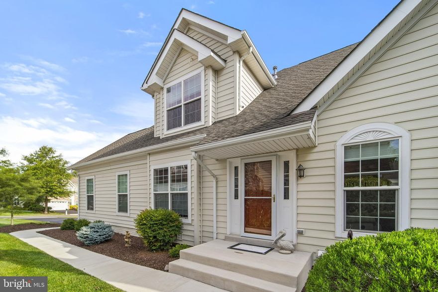 This Rarely-Available  Light-Filled South-Facing "Granview" model Features First Floor Owners Suite with Palladian-Style Windows and Expanded Sitting Area, Living Room with Vaulted Ceiling and Gas Fireplace, Dining Room, Gourmet Kitchen with Stainless-Steel Appliances and Quartz Countertop (2018),  Breakfast Area, Pantry, Laundry Room and Discreet Powder Room.  The Multi-Use Upper-Level Loft can be Spacious Family/Media Room, Home Office, or Play Area.   Two Large Bedrooms, each with Walk-In Closets and Guest/Hall Bath Complete the Upper Level.  Hardwood Floors Throughout the Home, Except the Two Carpeted Upper-Level Bedrooms.  The Lower-Level Basement with Plumbing Rough-In is Unfinished and Offers Plenty of Storage.   Updates Include Upper-Level Zoned Heat Pump (2017).  Additional 2018 updates include New Carrier HVAC System and Programmable Thermostat, New Hardwood Floor in Owner Bedroom and Loft, Refinished Hardwoods on Main Level, GE Profile Stainless Appliances, Commercial-Grade Hot Water Heater, and more.   The Private Deck and Brick Patio Back to an Open and Gently-Treed Common Area for Added Privacy.    Belmont Country Club is one of Toll Brothers' Premier Golf Club Communities, and offers a wonderful lifestyle.  Check also with the Membership Manager of BCC at 703-723-5330 for a tour of the Clubhouse and Facilities.  All property owners required to have additional Social Membership of BCC, $115 per month for use of Clubhouse and Facilities; Separate Golf, Fitness and Adult Pool Memberships are available.   Minutes to Dulles Airport, Whole Foods, Shops and Restaurants out the front Gate!
