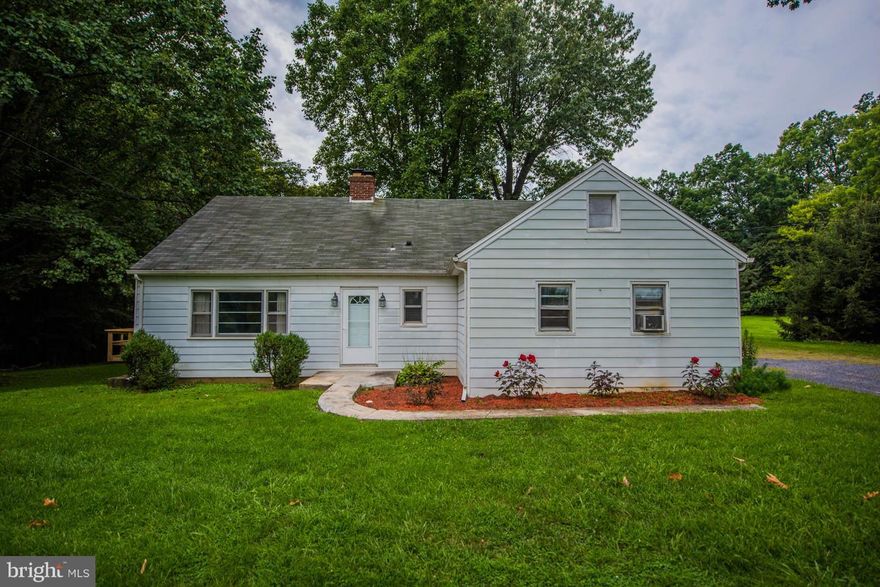 2.6 (2 lots) UNRESTRICTED acres just off of Rte 9 and I81. Potential for commercial use. Come revitalize this 4 bedroom 1.5 bath Cape Cod to it's yesteryear glory. Spacious kitchen, separate dining room. 2 bedrooms and office on main level and 2 more bedrooms upstairs. Rear covered porch leads to level, spacious lot. Large detached garage with 2 attached shed areas.
