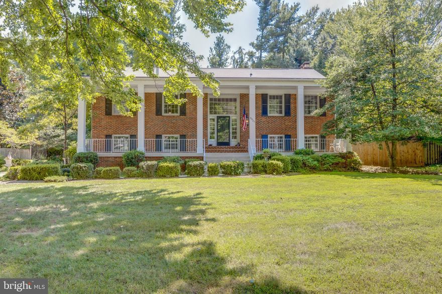 ROOMY! RELAXING! READY!  Owners have expanded/remodeled/improved 8027 Falstaff Road so that you only have to add furniture and begin enjoying living in McLean Hamlet...a most popular neighborhood.  No dark lower levels in this house as both levels are ABOVE GROUND and combined with walls of windows create a truly light-filled home.   The family room addition off the open kitchen creates a large gathering room with fireplace and deck access. The home office has brand new french doors that  open directly to a private patio. The lot is  approximately  15,000 square feet, beautifully  landscaped in a natural style with an additional  patio setting plus upper level  deck for dining al fresco.  Roof was replaced in 2016. Bathrooms were  remodeled in 2019.   Bring everything... it will fit!