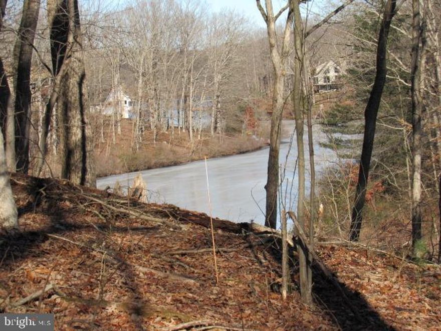 Prime Lakeside Building Lot – A Rare Opportunity!

Back on market through no fault of the Seller......Discover the perfect canvas for your dream home on this stunning 1 1/2  acre lot, nestled along the lake at Shannondale. This exceptional property offers direct water access, private shoreline, panoramic views, and is an unparalleled setting for relaxation and recreation.

Enjoy breathtaking sunrise and sunset views over the water, with mature trees, wildlife, and a mountain backdrop] enhancing the tranquil atmosphere. Whether you envision a cozy lakeside retreat or a luxurious custom estate, this property provides the space and flexibility to bring your vision to life.

Don’t miss this rare opportunity to own a piece of lakeside paradise. Contact us today for more details or to schedule a viewing!  Also available is the neighboring lot containing approximately 3/4 acre.  MLS WVJF2015756