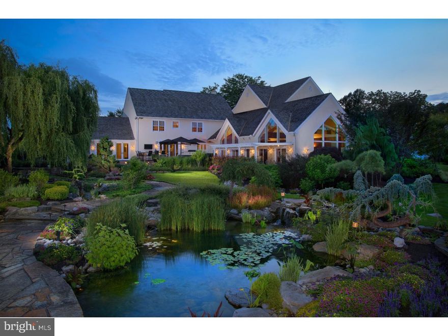 Enter through stone piers to a cobbled edged drive flanked by an alley of mature Crimson Maple trees to find an extraordinary Chester County residence positioned thoughtfully on nearly 34 verdant acres enjoying maximum privacy & dramatic arrival. Improving upon the natural beauty of the surrounding countryside, the current owners have created a true resort with detailed flowing brooks, Koi ponds, & waterscapes which wind their way past a covered pergola, designed for al  fresco dining, & a wide multi-person stone topped bar with all-weather television, hot tub & a large stone fire pit. Inspired natural gardens designed and brightened by ever blooming plants are complimented by a border of majestic centennial tress which ring the perimeter of the property, while multi-tier decks & intricate stone terracing provide unmatched opportunity for intimate or large scale outdoor entertaining. Equal attention was given the interior of the home with spacious formal rooms, 2 individual offices & a deluxe master Suite with sitting area, neutrally appointed en-suite bath & inviting 3 sided fireplace. 3 other family bedrooms & 2 baths complete this 2nd level. An exceptional, truly custom lower level offers a world class, temperature controlled walk-in wine cellar with 2,500 bottle storage, display cabinetry, uncorking station & full panel glass door exiting to a stone path & dramatic multi-foot waterfall. Just beyond the main recreation area & through double doors is a media room with stepped seating & 100" viewing screen. A dedicated bar with flat screen TV offers yet another entertaining area with seated granite counter, liquor storage & additional beverage refrigeration. Large outfitted gym with ceiling mounted fans, custom wood shelving & a mirrored wall with flat screen TV combine to create a bright, pleasant workout environment. An Olympic style 15' x 40' swimming pool & redwood sauna is enclosed with a volume ceiling, highlighted by exposed wood beams & expansive windows. A 2 bedroom, 1 bath In-law suite offers 1,537 square feet of independent living space with dedicated entrance creating a home that encourages & welcomes family or guests for short or extended stays. A 4 car attached garage as well as a 4 car detached garage with additional living space above & Yoga room to the rear appeals to the car enthusiasts, while the 34 acres divided between 5 separately deed lots appeals to a single user or to those in search of creating a family compound.