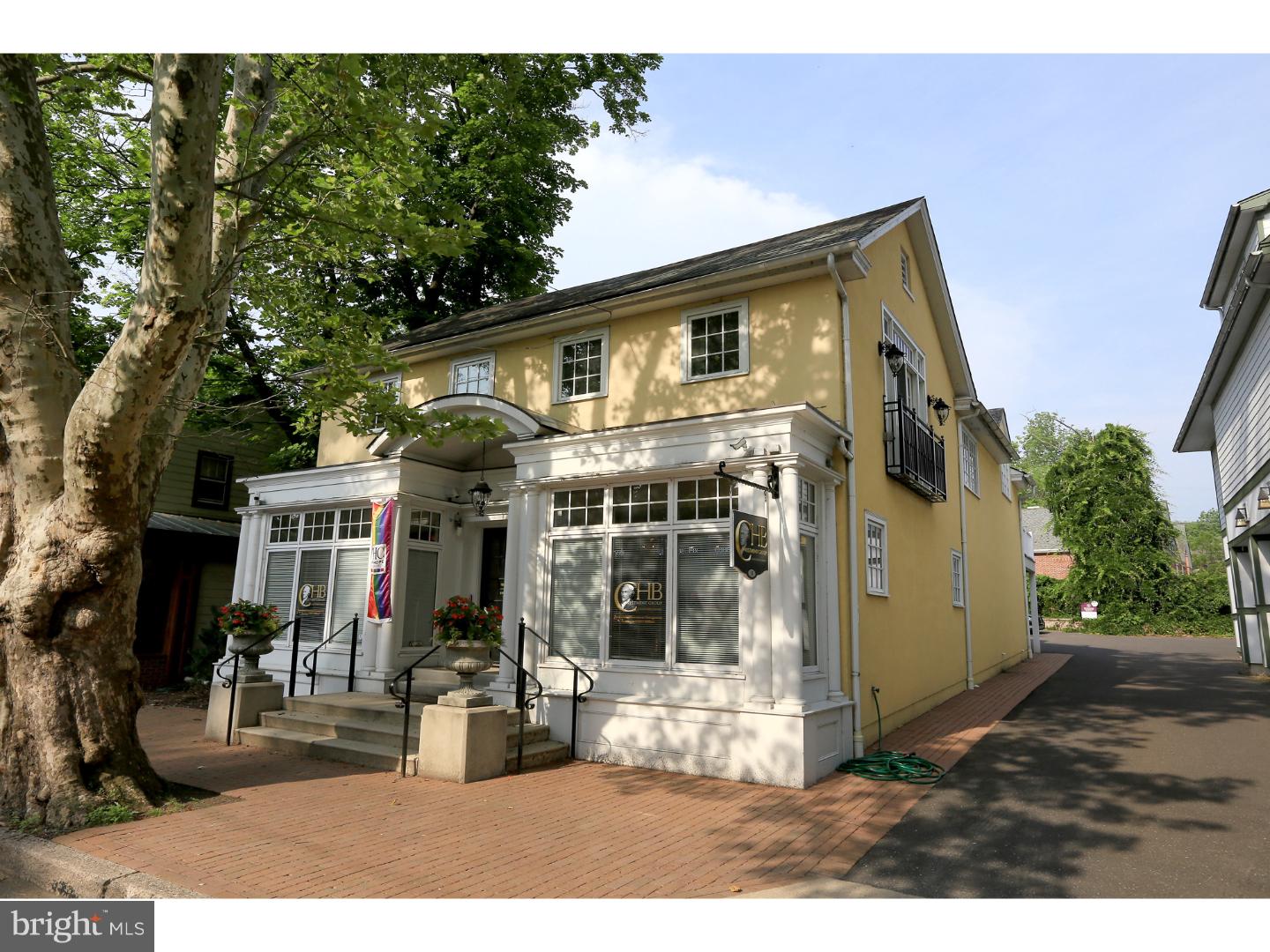 Fully occupied and thoroughly renovated building in downtown New Hope, featuring a longterm, street level office tenant and two upstairs apartments, 5 off-street parking spaces (3 for commercial tenant, one for each apartment), and fetching premium rents due to the full scale renovation by renowned local luxury builder George E. Michael circa 2006. All mechanicals, finishes, systems, etc are less than ten years young, no deferred maintenance or looming improvements to worry about as your money sits back and earns you a fine return versus the market. Photographs pre-date tenants, new photos coming soon.