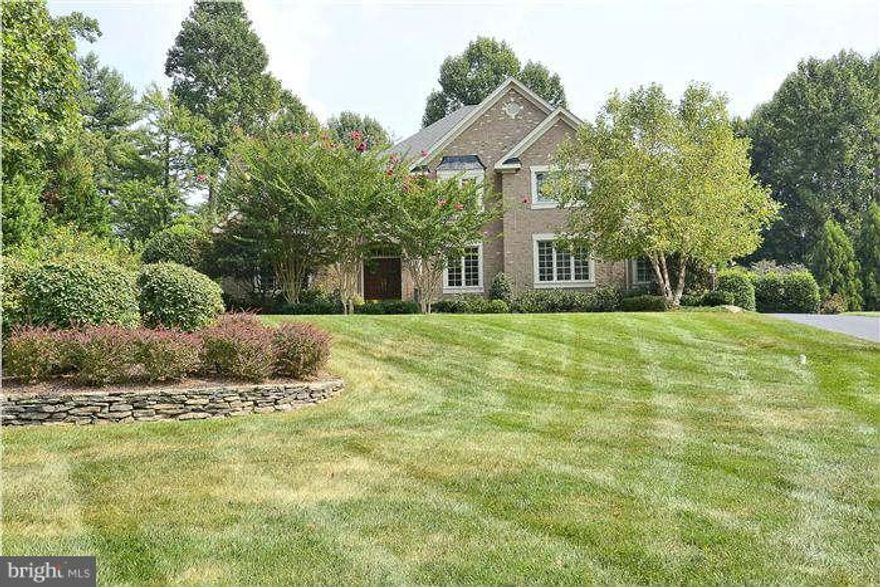 Stunning custom home . Incredible finishes, such as gourmet kitchen with Viking appliances & sub zero refrigerator, family room with coffered ceilings and stone fireplace, fabulous master suite w/sitting room and luxury bath. Lower level offers a 1,100 bottle climate controlled wine cellar, bar & game area, as well as Au pair suite. .Over 6,800 sg ft of living space