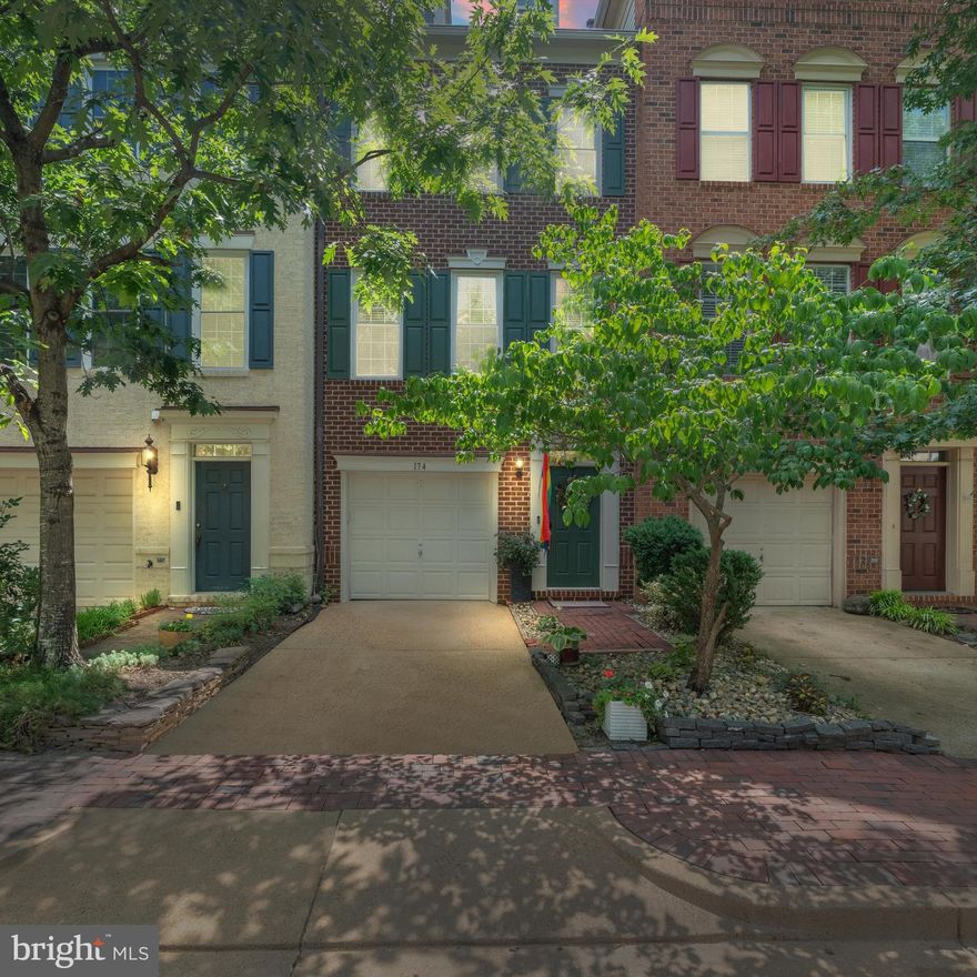 Welcome to this unique Gatsby model townhome. This property offers a distinctive floor plan that sets it apart from the usual Gatsby models. Privacy and convenience are paramount in this home, as each of the three bedrooms comes with its own en-suite bathroom. This setup allows for comfortable living arrangements for both owners and guests. Another unique feature is that the kitchen is located at the front of the home, seamlessly opening up to the main living area. White cabinets and granite countertops in kitchen.Kitchen Aid dishwasher (2020). Unlike the typical layout, there is no impeding wall between the kitchen and living area, creating an open and inviting space.
Living room features gas fireplace, which is conveniently situated on the main level rather than the lower level. It is accompanied by custom built-in bookcases, adding a touch of elegance and providing a cozy atmosphere. The entire house has been custom painted. The main level boasts refinished hardwood floors (2020), while the upper and lower levels feature carpeting (replaced in 2020). The roof was replaced in 2019, one HVAC condenser in 2020 and another in 2022. Smart thermostats recessed lighting, upgraded light fixtures and mirrors, and custom blinds, windows in the front of the house replaced. Primary bathroom was tastefully updated with new ceramic tile floors and custom vanity. New closet organizers in primary bedroom closet. Hardwired internet on 1st, 2nd and 4th floors for better WIFI coverage. 
Outdoor spaces include a deck off the living room, perfect for enjoying fresh air and relaxation, as well as a fenced brick patio accessible from the lower level family room. One-car garage, and the driveway is spacious enough to accommodate the second car.
This home is conveniently situated close to all the amenities of Cameron Station. It is just minutes away from Old Town Alexandria, Washington D.C., the Pentagon, shopping centers, and a variety of restaurants. The community also provides a shuttle bus service to the Van Dorn Metro station, granting easy access to public transportation. Additionally, residents can enjoy access to a pool, shops, a gym, and more within the community.
Don't miss out on the opportunity to make this unique Gatsby Layout home your own. It offers a blend of distinctive features, desirable updates, and a prime location.