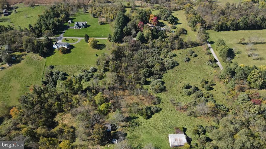 Build the home of your dreams on this beautiful and unrestricted 4.55-acre lot in Lovettsville! With no HOA to limit your creativity, this expansive and private property offers endless possibilities. 

Equestrian enthusiasts will love the freedom to bring horses and create their ideal setup, from stables to riding trails, with plenty of space to roam. The property’s peaceful and rural setting provides privacy and scenic views, making it the perfect spot for those seeking a countryside retreat. Despite the tranquil surroundings, you're still just minutes away from Lovettsville’s town center, local vineyards, parks, and other amenities.

With 4.5  acres of unrestricted land and no HOA dues, this property invites you to create your dream home in a picturesque Northern Virginia location. Whether you're looking for a weekend getaway or a full-time residence, this property is your blank canvas for an idyllic lifestyle!