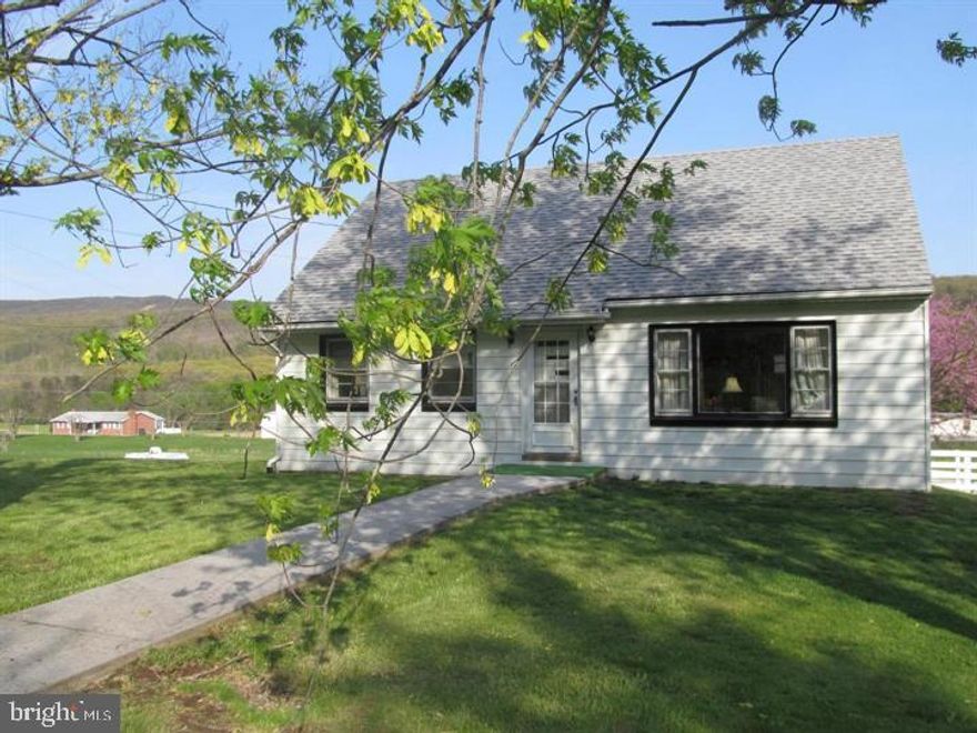 ADORABLE 4BR/1BA CAPE COD HOME SITS ON 0.71 UNRESTRICTED ACRES WITH A PEACEFUL, COUNTRY ATMOSPHERE. THE HOME OFFERS A SPACIOUS LIVING/DINING ROOM AREA THAT LEADS OUT TO THE SMALL BACK PORCH AND BEAUTIFUL BACKYARD WITH FENCED IN AREA FOR THE KIDS TO PLAY WHILE YOU'RE GRILLING OUT AND ENJOYING THE AMAZING VIEWS! THERE ARE 2 BEDROOMS ON THE MAIN LEVEL AND 2 ON THE UPPER LEVEL; FULL UNFINISHED BASEMENT WITH PLENTY OF STORAGE; OUTSIDE ENTRANCE TO THE BACKYARD; STORAGE SHEDS FOR YOUR LAWN AND GARDENING EQUIPMENT AND TOOLS. THE HOME HAS NEW FLOORING ON THE MAIN LEVEL AND NEW PAINT.  BEING SOLD AS-IS.
