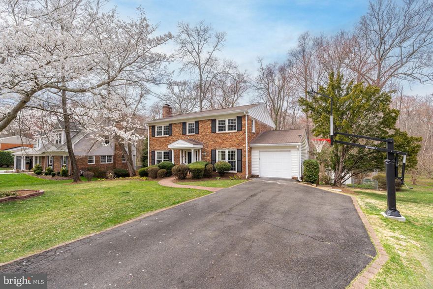 2.875% ASSUMABLE MORTGAGE - NO VA QUALIFICATION REQUIRED!

Welcome to Sutton Place! This stately brick colonial offers beautifully finished living space, situated on a picturesque acre in one of Fairfax’s most sought-after neighborhoods. Nestled on a quiet cul-de-sac, this home provides a serene retreat while maintaining easy access to Dunn Loring Metro, the vibrant Mosaic District, and major commuter routes.

Inside, the main level features an expansive, upgraded kitchen with an extended breakfast room, hardwood floors, and brand-new stainless steel appliances (range, microwave, refrigerator, and dishwasher—on order). A spacious family room opens to a large deck, perfect for entertaining, while a cozy gas fireplace in the living room adds warmth and charm. The main level also includes a bedroom and half bathroom, offering flexibility for guests or a home office. Upstairs, you’ll find four generously sized bedrooms and two full bathrooms, including a primary suite with ample closet space.

The fully finished lower level includes a sixth bedroom, a full bathroom, and a huge rec room (26 x 16) that walks out to a patio and landscaped backyard. The fenced-in yard features a playground set and offers direct access to the Gerry Connolly Cross County Bike & Walking Trail—perfect for outdoor enthusiasts!

Additional highlights include highly rated schools—Woodson High, Frost Middle, and Mantua Elementary—as well as access to the Mantua Swim & Tennis Club. With its prime location, abundant space, and thoughtful updates, this classic colonial is the perfect blend of comfort, style, and convenience. Schedule your private showing today!