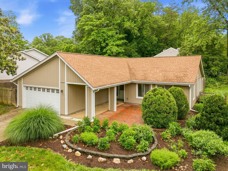 Welcome to this stunning single level ranch style residence beautifully positioned on a prime corner lot in the highly coveted Bonnie Brae subdivision of Fairfax, Virginia. This exceptional detached home offers the perfect blend of suburban tranquility and modern functionality. Spanning nearly fifteen hundred square feet of meticulously maintained living space, this contemporary gem features three bright bedrooms and two and a half bathrooms tailored for comfortable everyday living. Step inside to discover a bright and airy open floor plan accentuated by soaring cathedral ceilings, sleek laminate flooring, and elegant ceramic tile accents. The heart of the home is a spacious living area anchored by a beautiful fireplace, creating an inviting ambiance for cozy evenings or festive gatherings with loved ones. Culinary enthusiasts will delight in the dedicated breakfast area and the well appointed kitchen fully equipped with a modern range hood, self cleaning oven, and an icemaker refrigerator. Seamless indoor outdoor transitions are made easy via beautiful French doors and sliding glass doors that lead out to a pristine patio and porch setting. The sprawling corner lot provides a beautifully landscaped lawn, a partially fenced rear yard for maximum privacy, an extra storage shed, and an attached two car garage complete with an automatic door opener. This premium Fairfax County location delivers an incredible lifestyle for commuting, shopping, and entertainment seekers alike. Nestled in a quiet and highly walkable neighborhood, residents enjoy immediate access to pristine community sidewalks and scenic nearby parks such as Woodglen Lake Park and Sandy Run Stream Valley Park. Indulge in premier retail therapy and diverse dining options at the nearby Fairfax Corner, Fair Oaks Mall, and historic Downtown Fairfax. Commuters will benefit from superb proximity to major transportation arteries including the Fairfax County Parkway, I-66, and convenient public transit networks connecting you straight to Washington DC. Educational excellence is guaranteed as this property feeds into highly decorated institutions, allowing students to attend Bonnie Brae Elementary School located just a short walk away, as well as the renowned Robinson Secondary School. Call today for your private showing!
