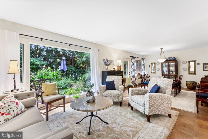 This is a one-of-a-kind condo that will truly blow you away. This two story unit has the feel of a townhome with its many amenities and features, most striking of which is the huge double pane living room picture window that overlooks the back yard with a truly Zen water garden – Giverny in Baltimore!  In addition, the living room has a welcoming fireplace, and it leads on to the dining room that also overlooks the back garden and generously sized patio.  A gourmet kitchen, first floor powder room and separate entry hall finish off the great first floor.  The second floor has 3 generously sized bedrooms and a separate hall bathroom and powder room.  This gem of a unit is tucked away from the hustle and bustle of the city, yet is conveniently located close to Towson, Roland Park, Mt. Washington Village and I83 and the beltway.