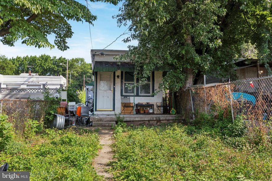 Unique opportunity to have an affordable, tiny house with a large yard in the city or rebuild a larger home on this oversized, street-to-street lot in the Wissinoming neighborhood. For a small investment in the kitchen and bath, you could make this a great home for yourself or rent it out until the time is right to build anew. It’s up to you! The plumbing and the water heater are less than six years old as are the structural supports in the basement. The roof was redone in 2023. Conveniently located just a half mile from the newly-built Shoppes at Wissinoming (Shop Rite, Wawa, Blink Fitness) and 1 mile from I-95. Get to NJ in just 6 to 9 minutes via the Tacony-Palmyra and Betsy Ross Bridges, respectively. Great opportunity! Cash or renovation loans only for this as-is sale.