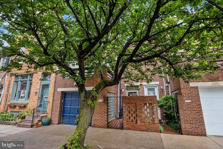 Discover 239 Fitzwater Street—a beautifully refreshed 4-bedroom, 2.5-bath home in the heart of Queen Village, where modern comfort meets timeless charm. With refinished hardwood floors and fresh paint throughout, this move-in-ready gem offers exceptional living inside and out.

Step into the first floor, where spacious living and dining areas flow into a cozy sitting room featuring custom built-in cabinetry, a gas fireplace, and dual sliding Pella doors that open to a private outdoor retreat. The two-tiered backyard oasis is complemented by two composite decks, ideal for entertaining or unwinding in style.

The chef’s kitchen is a showstopper, complete with a sleek stainless appliance package, 6-burner electric stove, double oven, dishwasher, granite countertops, and custom Italian tile backsplash. A deep stainless-steel sink offers views into the living space and serene backyard.

Upstairs, the second floor boasts a luxurious primary suite with 10-foot ceilings, a spacious 370 sq. ft. lounge area featuring a gas fireplace and wet bar, and a dedicated closet room with built-in organizers. Convenient second-floor laundry adds ease to everyday living.

The third floor includes two additional bedrooms and a stylish hall bath with dual sinks, glass shower doors, custom tile work, and a built-in shower niche. Every bedroom offers customized closets with smart storage solutions.

Additional highlights include: Three private outdoor spaces, Garage parking, Two fireplaces, Dual-zone HVAC, Sun-drenched hallway windows, Rich hardwood floors throughout (refinished April 2025)

And of course, the location is unbeatable. Nestled near Society Hill, you’re just minutes from beloved local destinations like Three Bears Park, Spruce Street Harbor Park, Head House Square, Washington Square, Zahav, Talula’s Garden, Bloomsday Café, and more.

239 Fitzwater Street offers a rare blend of luxury, design, and location—truly an exceptional opportunity in one of Philadelphia’s most coveted neighborhoods