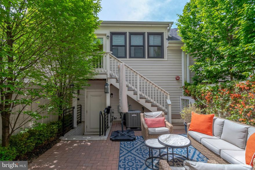 2104 Main Line Blvd, a stunning property in the heart of Potomac Yard - Alexandria, VA. This spacious executive style town home boasts 5 bedrooms , 4.5 baths, detached 2 car garage with ADU - an impressive 3,694 square feet of living space, offering an abundance of room for comfort and style.

As you step inside , you are greeted by an open floor plan that seamlessly connects the living spaces with 10' ceilings and oversized windows. The large kitchen is a chef's dream equipped with quartz countertops, beverage cooler,  and upgraded  stainless steel appliances. It serves as the perfect hub for cooking delicious meals or entertaining guests.

The house features five bedrooms and four bathrooms, each designed with elegance and comfort in mind. Hardwood floors run throughout the majority of the home, adding a touch of warmth to its modern aesthetic. 

The Primary bedroom boasts his/her custom built closet organizers, including a built in for jewelry and linens,  providing ample storage space while maintaining clean lines throughout.

Adding to its unique charm is a detached carriage house which includes an in-law suite above the garage – perfect for guests or additional living space. Not to mention this is one of the rare floor plans in the community to include a fully fenced in rear yard with lush landscaping for added privacy. 

Situated in Alexandria, VA, this location offers residents access to a variety of amenities within reach. From being able to walk to restaurants like Founding Farmers, and all the shops/dining options in Del Ray, to being just a quick 15 min walk to the Potomac Yard Metro and Target / Giant shopping centers and  more!! Reagan Airport is only 7 mins north, where Old Town Alexandria is 7 mins south, there's something for everyone here. Enjoy strolls along the Potomac River or explore Old Town Alexandria's charming brick-lined streets filled with boutiques and museums.

Not only does this property provide luxury living within its walls but also a vibrant community outside them. Experience all that beautiful Potomac Yard has to offer right at your doorstep when you make 2104 Main Line Blvd your new home.

Don't miss out on experiencing sophisticated living in one of Northern Virginia’s most sought-after locations.