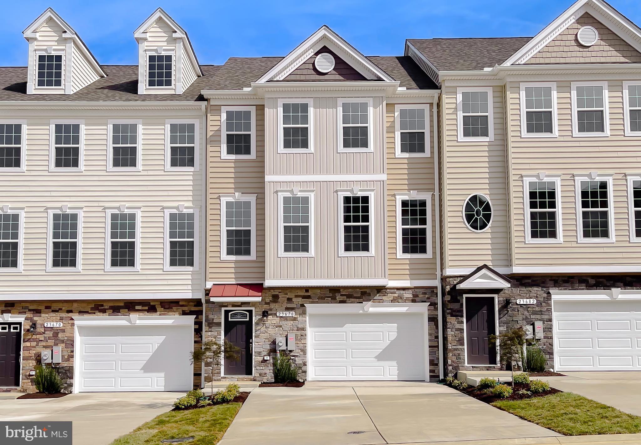 ***Immediate Delivery***Builder Incentive, Settle in 2025, Receive $6,000 in Builder Credit plus $12,500 in Closing Help OR $6,000 Builder Credit plus a 2/1 Rate Buydown AND $5,000 Closing Help with Preferred Lender & Title company.
Unit 88 Madison D2: New Construction: Madison D2 at Meadows at Town Run II 2604 Sq Ft | 4 Bedrooms | 3.5 Baths | 1-Car Garage
Welcome to the Madison D2, a spacious and thoughtfully designed townhome by Quality Built Homes located in the vibrant new community of Meadows at Town Run II in Leonardtown, MD. This 3-level, 2,604 sq ft interior unit offers flexible living space, starting with a main-level entry that opens into a finished rec room or 4th bedroom with a full bath, perfect for a guest suite or home office.
Upstairs, enjoy 9’ ceilings, luxury vinyl plank flooring, and an open-concept kitchen featuring 42" upgraded maple cabinets, upgraded granite countertops, a large center island, walk-in pantry, and stainless steel GE appliances. The kitchen flows seamlessly into the dining area and oversized family room, with access to a 14x12 maintenance-free deck overlooking your private, fenced-in backyard.
The upper level boasts a spacious owner’s suite with tray ceiling, walk-in closet, and a luxurious ensuite bath with dual vanities and QBHI’s signature deluxe tiled shower. Two additional bedrooms, a full hall bath, and a convenient laundry room complete the top floor.
Additional features include: Oversized 1-car garage and 2-car wide driveway, finished and painted garage with drywall, smart home technology with IQ Pro command center, Skybell camera doorbell, and smart thermostat
Low-maintenance exterior with stone-to-grade front (per elevation), sodded yard, vinyl fencing, and landscaping package. Community amenities include sidewalks, recreation center, pool, playground, pickleball, and tennis courts, all in the heart of charming Leonardtown.