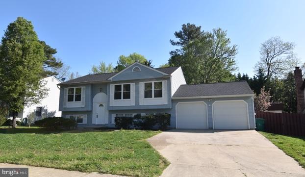 Remodeled kitchen in this home w/ granite countertops, soft close cherry cabinets, ceramic floors, wine cooler & vaulted ceilings in kitchen. Hardwood floors in family room & bedrooms upstairs. Roof is 6 months old and all the front windows have just been replaced. Basement is finished with a rec room & bedroom. Large unfinished area with laundry & 3 piece rough in. 2 car garage w/ workbench.