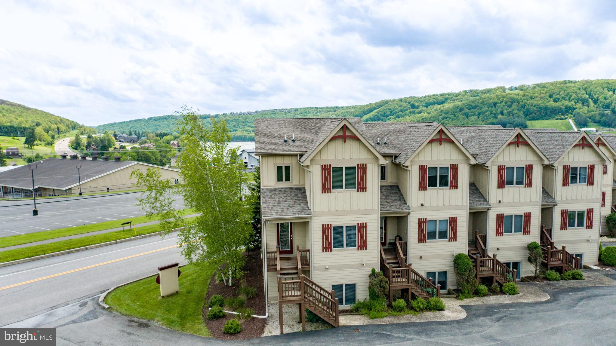 Looking for condominium living with western exposure for great sunsets, views of Wisp resort and lake views? 267 Mosser Road #1 may be the place for you! Offering 4 bedrooms, 3 full bathrooms and 3 levels of living with over 2000 square feet of living space, this end unit is sure to please. Enjoy the ease of maintenance of condo ownership so you can spend your time at the lake making memories! The functional floorplan offers 1 bedroom and full bath on main level, 2 bedrooms and 1 full bath upstairs, and 1 bedroom with full bath downstairs. Multiple living rooms provide room to expand throughout the home. The walkout basement offers a hot tub just outside the basement slider door. Established vacation rental property! Located in the heart of McHenry, this home offers location within minutes to all of the amenities and attractions you come to the area for! Call today to schedule a private showing at this excellent property!