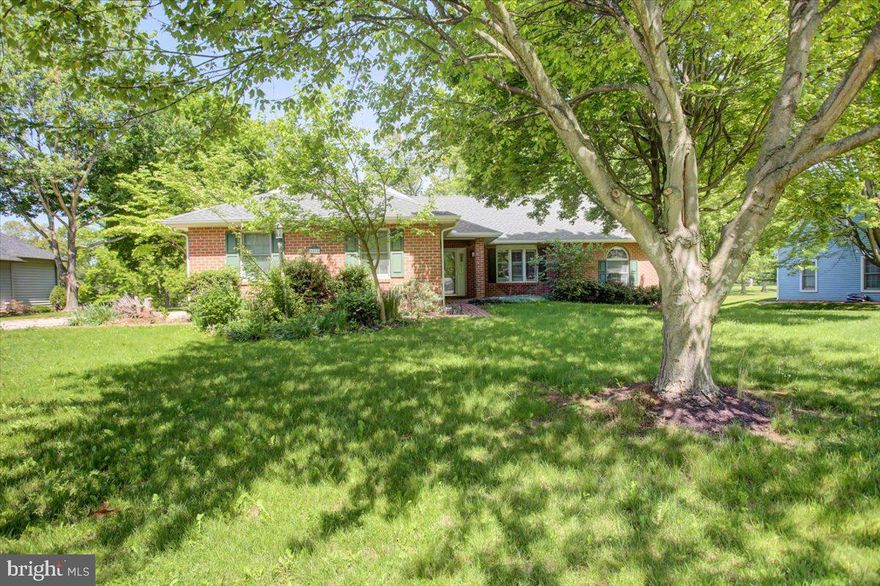 Lovely Brick Rancher 3 bedrooms, 2 updated baths with hardwood floors, upgraded gourmet kitchen with plenty of cabinets for storage, stainless steel appliances, & granite counters. Family room beamed ceiling with gas fireplace. Main level laundry, Sunroom with views of golf course. Finished lower level. with cedar closet. Ready for you to move into today!