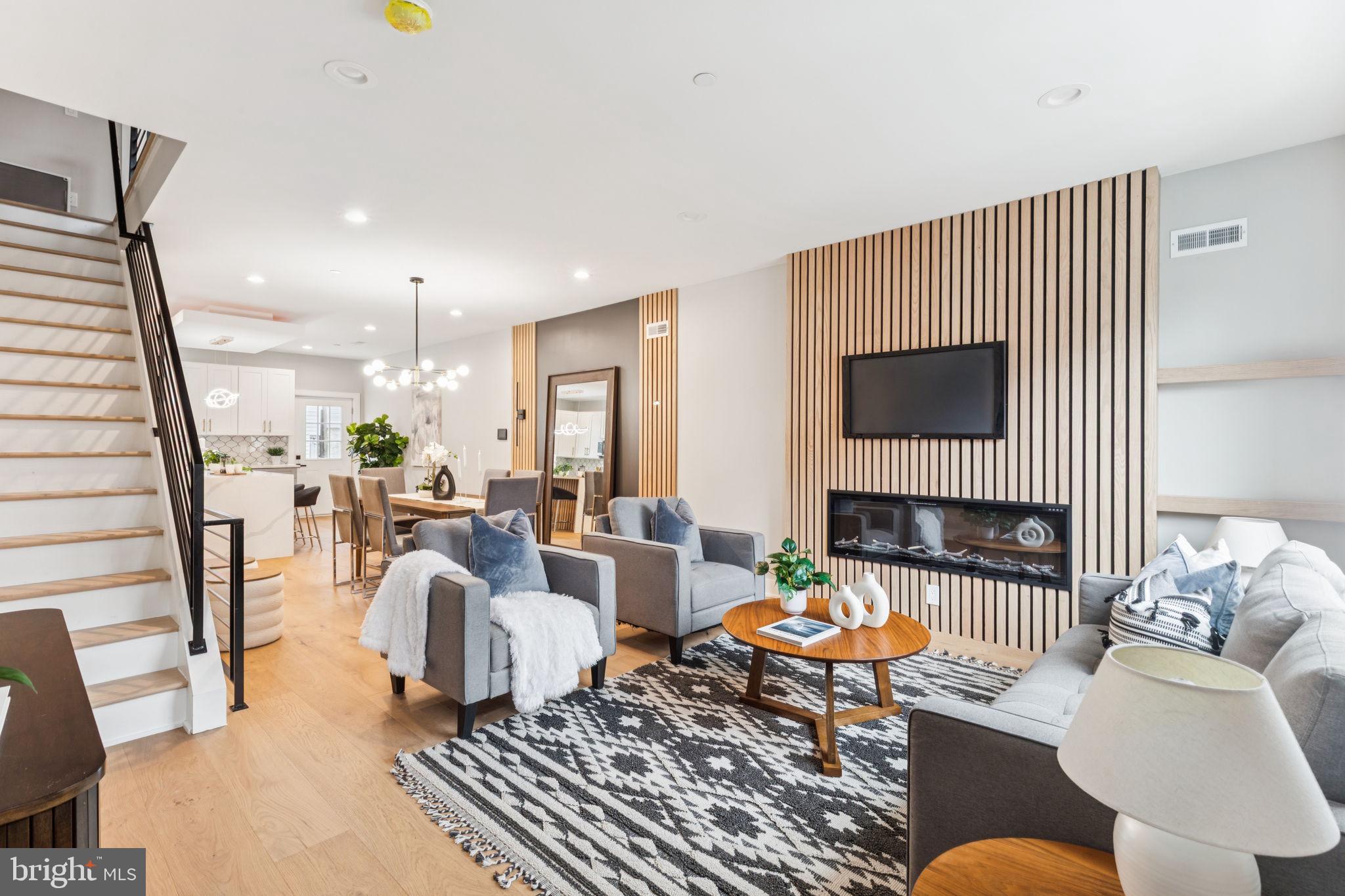 Welcome to 2708 E Birch Street, a stunning brand new construction 4 bedroom, 4 bathroom home in the heart of Port Richmond! At just under 3000 sq ft, this gorgeous home boasts 3 outdoor spaces, dual zone hvac, and a 10 year tax abatement! Enter into this open concept layout and be greeted by white oak hardwood floors, recessed lighting throughout, a cozy fireplace, and fluted accent walls! The chef's kitchen features stainless steel appliances, quartz countertops, custom tile backsplash, white shaker cabinets, and a waterfall island with barstool seating. Step outside to the back patio, perfect for entertaining guests in the summer months! Up on the 2nd level, you’ll find 2 spacious bedrooms with ample closet space and 2 full bathrooms. On the 3rd level, you’ll find the primary suite that includes a walk-in closet and an en-suite bathroom with double vanity sinks, glass shower doors and rain shower head. The finished basement offers an in-law suite with a large bedroom and full bathroom, extra storage space, and room for a secondary living area, home office, or gym! The highlight of this home is your very own rooftop deck with skyline views! In close proximity to all of the restaurants, bars, grocery stores, parks, and coffee shops that Port Richmond has to offer, this home is in a perfect location. Schedule your showing today!