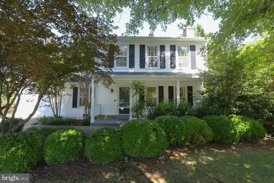 Newly listed in popular Great Falls Forest checks all the boxes!  You will love this A+ home from the moment you are welcomed by its pretty, covered front porch.   With its easy floor-plan highlighted by neutral colors and wood floors, the main level has flexible space for living and dining with a wood burning fireplace (untested by owners and conveying "as is").  A coveted coat closet and half-bath are tucked neatly into the entry and front hall. The well equipped kitchen features ample cabinets, granite topped counters, brushed stainless steel appliances and a handy breakfast bar.  The adjoining family room includes an attractive desk area and offers access to the full-sized deck and big back yard.  Upstairs includes a nicely sized primary bedroom with double closet and a very attractive ensuite bath. There are two additional bedrooms, full hall bath and linen closet.  The nicely finished lower level has tall ceilings and includes a cozy recreation/play room, bonus room, laundry utility room and oversized closets for easy storage.  There is an attached one car garage and exterior storage shed.  The vintage play fort and accessories convey "as-is".  Of special note, the HOA fee is a low $120 for 2022. HVAC replaced in 2016, Water heater replaced 2015, Roof about 2014, Washer & Dryer in 2019 **Please wear a mask while inside.