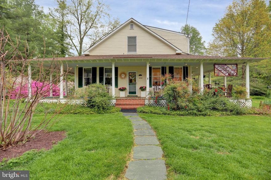 A hidden suburban oasis awaits you at the end of a private lane!   This classic southern farmhouse oozes charm  and has many original details in addition to  many modern updates. The expansive wrap around covered porch has a  traditional blue ceiling that  is a special feature in the south. It is perfect for entertaining, bird watching, sipping your morning coffee or just for languishing reading your favorite novel.   The private manicured grounds are ideal for the most discerning gardener for both floral and vegetable  beds with plenty of room  for croquet, a horseshoe pit and a swing set...bocce anyone?  In addition to the tool shed, the property  features several adorable and very useful outbuildings that offer countless possibilities. One of the outbuildings has been used a home office and features a cozy wood burning stove with a separate storage area.   The  second outbuilding boasts a private third bath and kitchenette!  This  special property is being sold "As Is".
