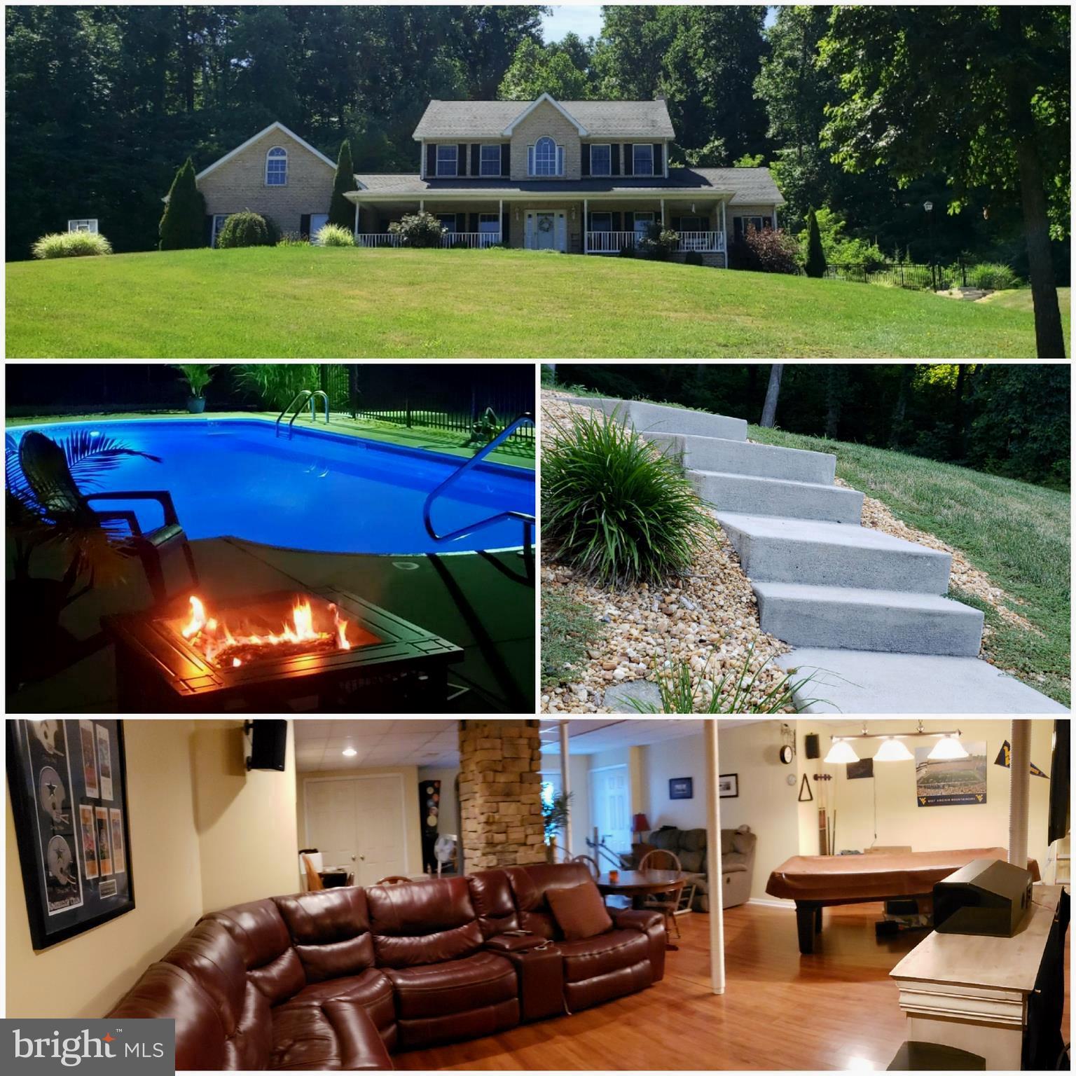 Custom Brick Colonial in Overlook Woods is well appointed on 4 acres with gorgeous seasonal views. Home features 4 BEDROOMS, 3.5 BATHS, Main Level Master Bedroom/Bath, Walk-In Closet. Family room opens to kitchen & nook. Kitchen features 42" Amish crafted oak cabinets, granite countertops, oversized stainless farmhouse sink, & stainless steel appliances. 9 Ft ceilings throughout the main level. 2 x 6 construction. Recessed lighting, ceiling fans, dimmer switches, crown molding, Andersen tilt windows, architectural shingles & more. Inground saltwater pool with Pentair underwater color changing LED light. Pool area is fully fenced with wrought iron fencing & two e-z close gates. Lots of space on patio for entertaining. Front yard has invisible fence installed. Whole house water filter, security system, attached 2.5 car garage, floored attic above garage for additional storage. Finished basement has open concept, soapstone wood stove, plenty of room for entertaining, separate storage area. Enjoy peace & privacy in one of the nicest neighborhoods in the area. Neighborhood has streetlights & underground utilities. * Square footage dimensions are very close but approximate. Listing Realtor is co-owner. More photos to come.