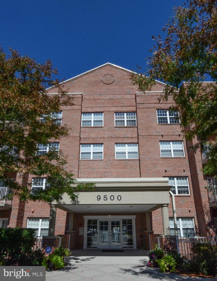 Enjoy luxury condo living at its best in this sun filled upgraded unit! Elegant kitchen w/granite and SS appliances open to spacious family room w/gas fireplace.Stunning hardwood floors in kitchen& family room.Large M bedroom w/walk in closet& full bath,2nd BR, Den/office, Living room,Dining Room & balcony complete this package. Private garage parking space comes with this unit! Welcome home!