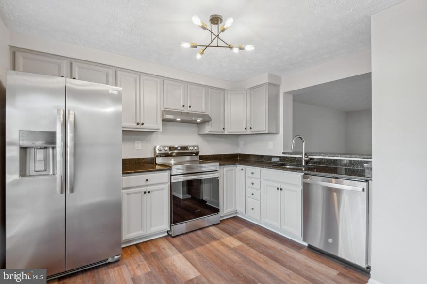 MLS Virtual Tour has been uploaded***  THREE LEVEL TOWNHOME COMPLETELY REMODELED TOP TO BOTTOM**  END OF CUL-DE-SAC SETTING WITH A PRIVATE DECK & FENCED REAR YARD** REFINISHED HARDWOODS ON MAIN & UPPER LEVELS** NEW CARPET LOWER LEVEL** BRAND NEW BATHROOMS ON ALL THREE LEVELS** OPEN REMODELED KITCHEN W/NEW STAINLESS APPLIANCES; GRANITE COUNTERS; NEW CABINETS; LIGHTING & LVT FLOORING**  BRAND NEW WINDOWS & SLIDERS** ENTIRE HOME COMPLETELY REPAINTED** FULL FINISHED WALKOUT LOWER LEVEL WTIH SECOND FULL BATH & NEW LAUNDRY/STORAGE RM*** A++ CONDITION COMPLETELY TURN-KEY!!  CPRA = $772/YR...  CRADLEROCK MEWS HOA = $808/YR