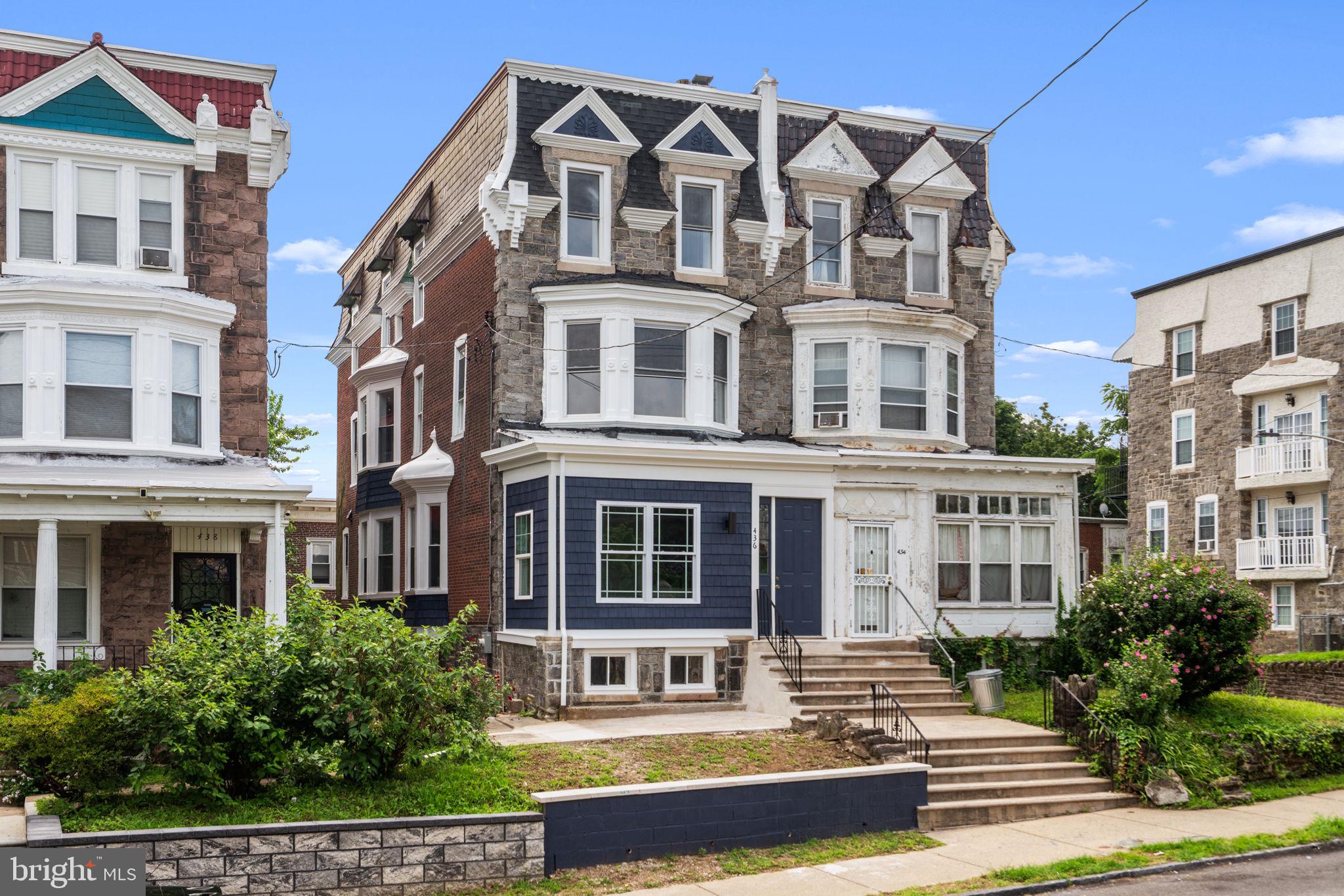 Welcome to this stunning fully renovated 2700 square foot twin home located at 436 E Tulpehocken Street in the Germantown area of Philadelphia. Enter into the large indoor porch area before stepping into the open concept layout on the main floor. Both entry doors being 9 feet in height for easy access. The main level is stunning featuring a custom wall with an electric fireplace, a custom bench storage area, living room and dining room space that is bright with plenty of windows throughout. The kitchen area is a Chef's delight featuring a 9-foot kitchen island with quartz countertops, an undermount microwave, a gas stove and a large farm sink. There is recess lighting and wood flooring flowing seamlessly throughout the home. The second floor offers two bright and airy bedrooms with plenty of closet space and two full bathrooms. The master bathroom has a double vanity, a large stand-up shower with a glass shield and a soaking tub which is a perfect way to unwind after a long day. The third floor has three bedrooms and one full bathroom. The fully finished basement has a full bathroom, utility closet and washer and dryer hookup with storage space. You can walk out from the basement to the fenced in backyard which is 80% concrete so you can entertain your guest seamlessly. There is plumbing installed in the basement if you decide to add a kitchen later. The windows, doors, railings, central air, heating, plumbing and electric are all brand new. This property is close to a variety of Philadelphia attractions, shopping, schools and public transportation. Schedule your showing today!