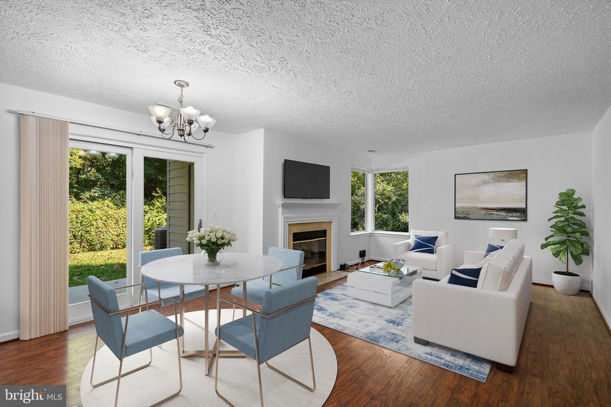 Tucked away in a private little oasis, you’ll find yourself in a beautifully updated 2BR/2BA condo.

Sparkling new white shaker cabinets, granite countertops, some new appliances, and porcelain flooring in the eat-in kitchen will inspire your inner chef to emerge.  Lots of storage and pantry space to put away all your goodies.

Cozying up by the fireplace, you can watch the snow fall on the private woods beyond in winter!  Play catch out there in the spring.

Two ensuite bedrooms allow spreading out, each with access to its own freshly renovated baths…beautifully tiled and perfect for you.

All the Reston amenities are at your fingertips along with amazing commuter options.