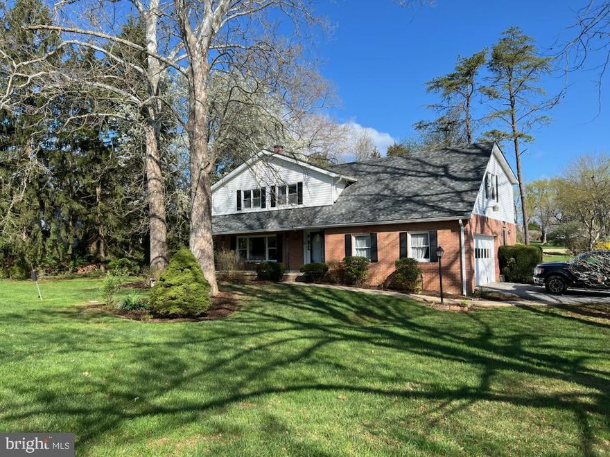 Deadline for Highest & Bests Offer: Monday 4/14th at 12:00n         Introducing 1901 Lyden Rd in the Pot Spring corridor community of Valley Garth! This wonderful 5BR-4 Full Bath Colonial sits on a gracious acre lot & has an oversized 2 car garage, covered front porch & a rear stone patio. Enter into the two story foyer with its sweeping curved staircase. To the left is a very large living room with a  wood-burning stone fireplace that connects to a formal dining room. Enter the spacious granite eat-in kitchen from the center hall foyer or the dining room. The kitchen is comfortably open to family room to the rear of the house. The family room has hardwood floors, a brick 2nd fireplace with a gas hook-up option. The family room opens onto a stone patio. Beside the kitchen is the laundry room/mud room area, and a very nice 1st floor office/den with its own exterior door, next to a 4th full bath.  The upper level are has a large primary BR & bath with hardwood floors, a walk-in closet + a LG double closet and is large enough for a sitting room or exercise area. There are an additional 4 BR's with hardwood floors on this level and they are served by 2 additional full hall bathrooms. In the huge lower level you will find a incredible finished space for a man-cave, teenager hang-out, recreational fun and hobbies! New Roof in 2017-New Hot Water Heater 2022-The 2 Zones of Gas FHA Heat & Central Air Conditioning includes a brand new Furnace/CAC sytem in the lower level & the 2nd zone in the attic has a brand new CAC system & a 10 year old gas furnace in good working condition. Both of the fireplace chimneys have been inspected & all needed work has been completed+the furnace flue also has a new flue liner! Please note that the windows & the left sink in the back upstairs bathroom are being sold 'AS-IS'.  Sellers are providing a First American One Year Warranty!! Enjoy the peaceful nature of the coi pond off the patio, & the blooming flowers of this beautifully  landscaped  yard.  Come tour this wonderful home as soon as possible!