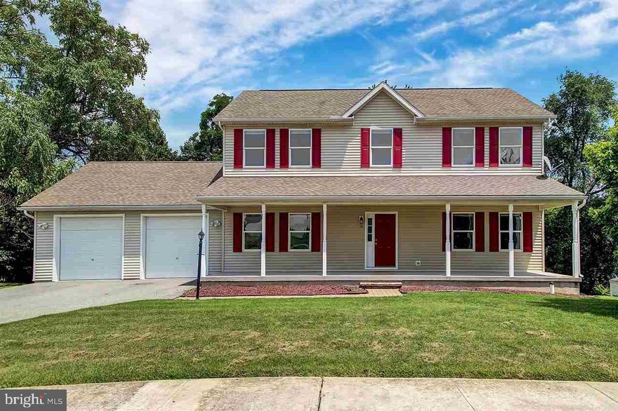 Big & Beautiful! Fun for all ages! Relax on the giant porch overlooking the spacious yard or grab your gear & head over to the horseshoe pits for a little competition. Over 3000 square feet awaits in the spacious home.  4 bedrooms, 2.5 baths, 2 car garage, 2nd floor laundry, complete w/ finished walk-out basement. Family room boasts beautiful stone fireplace.  Large bedrooms & formal dining room. No HOA! 100% financing available. Call today!