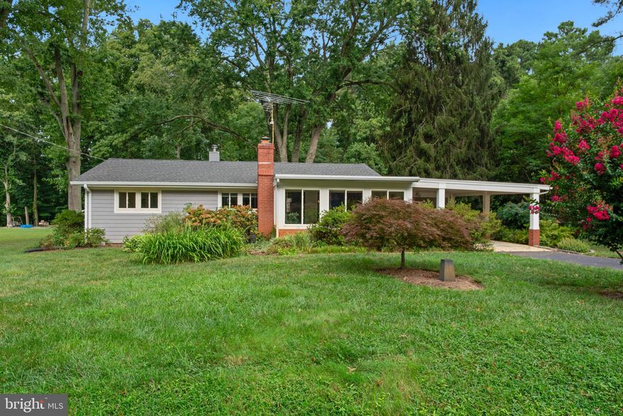 Welcome to your dream home in the highly sought-after water access community of Chesapeake Landing!   Pride in ownership shows in this well maintained 3-bedroom, 2-bath  priced to sell charming rancher.  Listed below appraisal means instant equity!  The home includes a spacious dining and living room combo that is perfect for entertaining and creating lasting memories.  Kitchen has a breakfast bar for busy mornings and offers an abundance of storage.  The oversized  bonus room with separate entrance offers endless possibilities.  The sunroom and cozy brick fireplace offer warmth and comfort during the winter months. Outside you will find a spacious brick patio, perfect for entertaining guests or a family BBQ.  The attached shed is complete with water and electricity, making it a great garden nook, or workshop area, the choice is yours.  Convenient outdoor access through bilco doors to a concrete floored 15.5' X 7.5 low ceiling utility room for the homes water softener, water heater, well pump and many other mechanical systems.  Off street parking, paved driveway and carport make this home complete.  Located less than 500 feet from the Worton Creek, this home offers the perfect blend of tranquility and convenience.  By joining the voluntary Community Association, you gain access to several maintained walking trails and the option of boat slip rental at either of the two community-maintained marinas.  This well-kept gem is waiting for you to call it home!  Recent upgrades include new roof in 2019 and gutters installed in 2020.