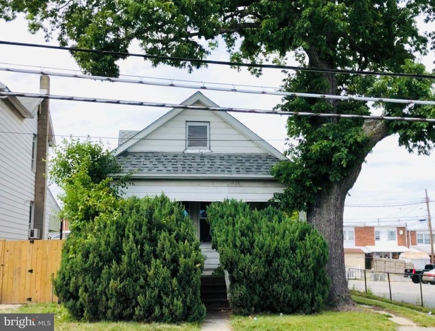 Renovation, investment opportunity on this turn of the century bungalow with unique features. Wrap around covered porch with slate floor, rear porch with awning, and oversized windows are some of the home's features. Enjoy spacious rooms, crown moldings, and 9 foot ceilings.  Bedrooms, bathroom, and laundry area are main level. Walk up attic with dormers and half bath, could make into a bedroom and another full bath. Wood parquet flooring, wood built-in, and traditional pink and green tile bath. This home needs tlc but is very solid and spacious. Driveway for parking, fenced back yard, and shed. Convenient location to shops, dining, and 695.  Sold as-is and part of an estate and is sold together with adjoining lot (.05ac).
