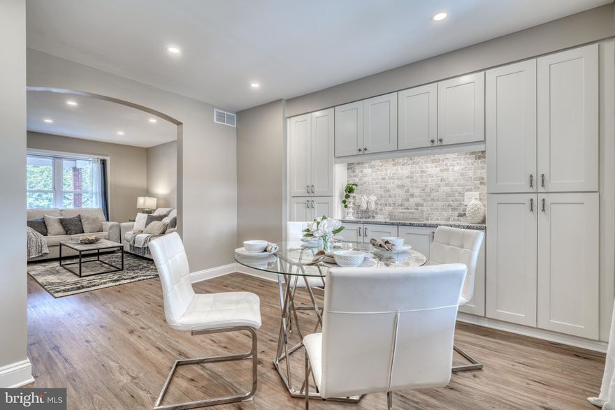 *** MOVE RIGHT IN !! *** to this GORGEOUS NEWLY RENOVATED 3 BEDROOM /1 BATH w/LOWER-LEVEL FAMILY ROOM, NEW WINDOWS,  & ROOFED 11x7 FRONT PORCH w/FLAGSTONE & NEW STORM DOOR w/SLIDING VIEW GLASS/SCREEN.  *** MAIN LEVEL INCLUDES:  LIVING RM, DINING RM, & KITCHEN WITH NEW RECESSED LIGHTING & DIMMER SWITCHES IN EACH ROOM for AMBIANCE, & LUXURY NEW VINYL PLANK FLOORING THROUGHOUT ... DINING ROOM w/ 10-FT LONG WALL of FLOOR-TO-CEILING  SOFT-CLOSE CABINETRY w/ TUMBLED STONE & LIT GRANITE BUFFET COUNTER  for EXTRA STORAGE... KITCHEN w/NEW STAINLESS STEEL APPLIANCES including 5-BURNER GAS STOVE w/GRIDDLE & STEAM-CLEAN, BEAUTIFUL TUMBLED STONE BACKSPLASH, GRANITE COUNTERS, SOFT-CLOSE CABINETRY, & AMPLE LIGHTING OVER DEEP SINK, w/EXIT TO REAR YARD w/NEW DECK/STAIRS & VINYL RAILING  LEADING DOWN TO ROOF-COVERED PATIO AREA AND NEW SIDEWALK.  *** UPPER LEVEL OFFERS ACCESS to a FLOORED & LIT ATTIC, 3 BEDROOMS ALL with NEW CARPETING, & A COMPLETELY RENOVED FULL BATH w/PLANK TILE FLOORING, TILE SHOWER, as well as having a LINEN CLOSET CONVENIENTLY SET INSIDE THE BATHROOM. *** LOWER LEVEL IS COMPLETELY FLOORED w/LUXURY VINYL PLANK FLOOING and PROVIDES OPEN SPACE FOR ROOMS INCLUDING A 17x13 FAMILY ROOM, & UTILITY ROOM w/W/D HOOKUPS, UTILITY SINK, & EXIT TO REAR YARD.   *** NESTLED JUST OFF NORTH POINT BLVD,  CONVENIENT TO SHOPPING, RESTAURANTS, & NEARBY POINTS OF INTEREST (SPARROWS PT. GOLF & COUNTRY CLUB ... A SHORT WALK to NORTH POINT STATE BATTLEFIELD PARK ... 10 MIN to NORTH PT STATE PARK (with HIKING TRAILS, BIKING TRAILS, PICNIC AREA, SWIMMING AREA, & FISHING PIER), ... only 6 MIN to STANSBURY PARK w/WALKING TRAIL, POND & FISHING PIER & PLAYGROUND, MERRITT PARK & CHESTERWOOD PARK, TO NAME A FEW), & w/MINUTES DRIVE-TIME TO 695 & 95, THIS HOME PROVIDES A WONDERFUL OPPORTUNITY!! *** DON'T MISS THIS !!! ***