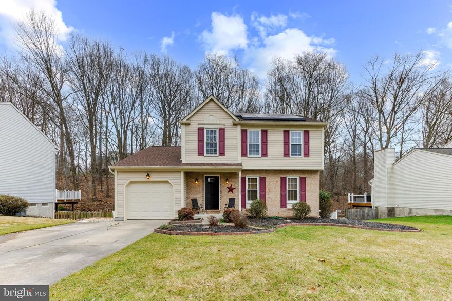 The moment you step inside this meticulously maintained colonial, it is obvious the home has been updated and well cared for. The beautiful hardwood floors run throughout the main level and provide a timeless elegance to the space. On this level are a roomy family room and dining room, a modern kitchen with space for an eat-in table, and a family room / den with a stunning fireplace and tall ceiling. A slider installed in 2021 leads to a beautiful screened-in porch, perfect for lounging outside for a breeze but without the bugs. Trex decking with vinyl trim is within the screened-in area, and also leads down some stairs to another section of decking outside, perfect for a spot to grill closer to the pool. Down a few more stairs and you're at your own private in-ground pool in the backyard, with a brand new pool liner and pool cover, both installed in 2023. The pool pump filter was also recently replaced. Surrounding the entire backyard is a beautiful white vinyl fence. Back inside, the upper level offers three generous bedrooms, including a primary bedroom with its own full bathroom. There is also another well-appointed full bathroom in the hallway. The carpet was completely replaced in 2019, and there is a fresh coat of paint throughout the home. There is also a full unfinished basement which includes the laundry, a new electrical panel installed in 2022, and another recently-installed slider out to the pool deck. The basement could be finished by a new owner to add even more finished living space and increase the value of the home. The lower section of the roof was replaced 2 years ago, and the upper section of the roof was replaced in 2012. A one-car garage provides enough space to park a car inside or for storage, and there is enough space on the driveway for two cars as well. The installed solar panels help to provide energy to the home and have saved the sellers on energy costs, and this privilege will pass to the new owners. The home sits in a wonderful, quiet neighborhood, in a sought-after area with great schools. Don't miss your chance to see this beautiful home!