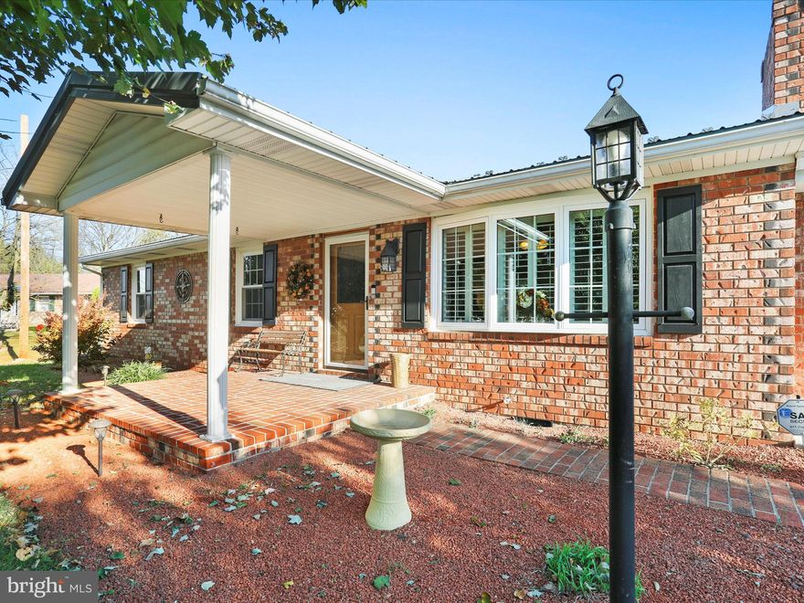 Discover the charm of this exquisite ranch-style home nestled in the well established neighborhood  Sky-Lin Park.  With 1,196 sq. ft. of meticulously maintained space, this residence boasts three spacious bedrooms and 1.5 baths, perfect for comfortable living.  Step inside to find stunning hardwood floors and elegant crown moldings that enhance the inviting atmosphere. The heart of the home features a modern kitchen with upgraded countertops, a mobile island, and seamless access to the family room, ideal for entertaining.  Enjoy cozy evenings by the brick fireplace or unwind in the serene outdoor spaces, including a beautifully landscaped front yard and a private fenced rear yard. The exterior showcases durable all brick construction, Central AC system only one year old, metal roofing replaced just five years ago and is complemented by a charming front porch and large brick patio for outdoor relaxation. Additional highlights include a spotless attached garage with ample storage, a main-floor laundry area, and a 12' x 18' two story insulated outbuilding complete with electric, concrete first floor and finished second level for secure storage or could be easily modified to have a separate in-law or guest suite!  This home is a true gem, blending timeless craftsmanship with modern conveniences, ready to welcome you home.