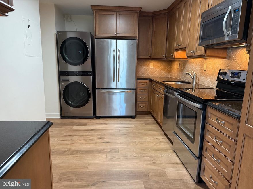 Welcome to 309 Yoakum Parkway #1218, a stunning 3-bedroom, 2.5-bath condo offering 1,621 square feet of beautifully renovated living space. Perched on the 12th floor, this home boasts breathtaking views from a private balcony, creating the perfect backdrop for both relaxation and entertaining.

The interior has been thoughtfully updated with modern finishes throughout, featuring a spacious open layout, abundant natural light, hardwood floors throughout, and stylish upgrades. The kitchen is sleek and functional, while the primary suite includes a private bath and generous walk-in closet. Two additional bedrooms and updated bathrooms provide comfort and flexibility for family, guests, or a home office.

Located in the desirable Watergate at Landmark community, residents enjoy a range of amenities along with easy access to shopping, dining, and commuter routes. This is a rare opportunity to own a move-in ready home with incredible views and a contemporary lifestyle.