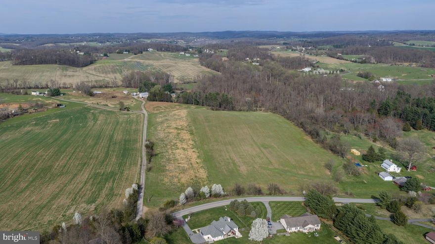 Engineering has been done on this scenic 4.32-acre lot just minutes away from Westminster and Taneytown; however, you can still change the location of the house. Two Magnificat lots available! Purchase this one and the adjacent 1.75 acre  lot and create a family compound.  Preliminary approval for house location. Approved conventional perk for a 4 bedroom home.