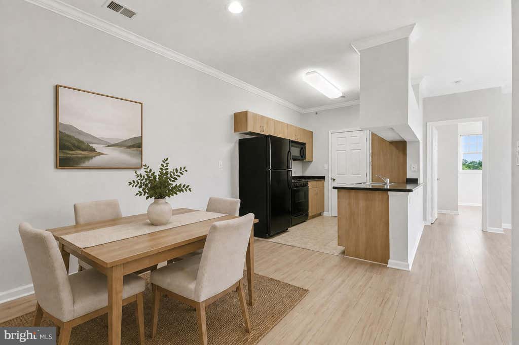 Photo of 19611 Galway Bay Circle #402, GERMANTOWN, MD 20874 (MLS # MDMC2248796)