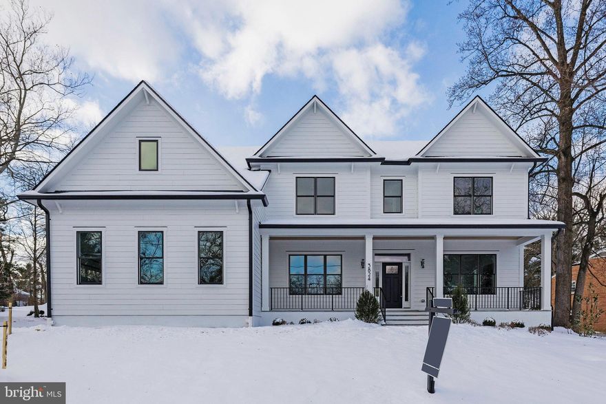 Open Saturday 1-3pm Now Complete! Reel Homes presents an exquisite home nestled in the highly sought-after Mantua Subdivision. This residence, adorned with a Three-Car Garage, graces a pristine 0.60-acre Lot. Discover the Main Level Spacious En-Suite Bedroom accompanied by an additional 5 Bedrooms Upstairs for unparalleled comfort. The Kitchen, a Chef's Dream, features a 6-Burner Wolf Range, a 48-inch Sub Zero Refrigerator, and a Bosche Dishwasher set amidst Custom Cabinets. Custom ceiling work adorns the entire Main Level, harmonizing with the wide beautiful Hardwood Floors. Elevator Ready! Step onto a spacious Front Porch or enjoy the Mudroom with Cubbies, Drawers, Custom Tile, and a separate Half Bath. The Main Level Study/Office, (2 Home Offices Optional), seamlessly connects to the Family Room boasting a Fireplace. The Lower Level beckons with a generous Recreation Room, Bedroom with a Full Bath, and a Media Room. Pella Exterior Clad Windows and Doors add detailed finishes. The backyard, complete with a Deck, offers ample space for a Pool or Sport Court. A Commuter's Dream. Within one mile of Pickett Road shopping center, Trader Joe's, Lifetime Fitness, and Cinema Arts Movie Theater. Conveniently close to Vienna metro station and Mosaic shopping center, with Fairfax Hospital in proximity. Woodson High School and Mantua Elementary.