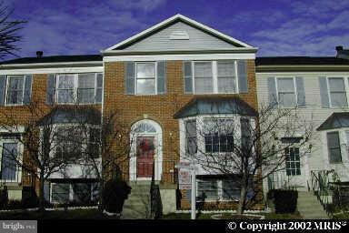 Gorgeous and Spacious 3 full level Brick Front, 3/4 Br's & 3.5 baths, deck, bay window, hardwood floors in Living Room, kitchen w/Sunroom breakfast area & granite counter, New flooring on upper level and basement. Finished basement with wood fireplace, fully fenced backyard with Deck & patio. Close to shopping, I-270 and Public transportation.