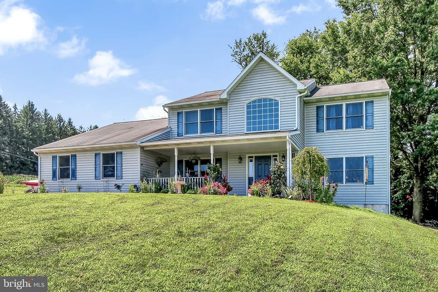You must see this beautifully updated home in Daniel Boone School District!  Built in 2004, this great single is perfectly situated on a gorgeous 2 acre lot with plenty of privacy and amazing countryside views.  Inside, the grand two-story family room is bright and spacious and highlighted by an impressive stone accent wall with a pellet stove fireplace to keep your heating bills low.  The newly remodeled eat-in kitchen has granite countertops that include an island, stainless steel appliances, new modern lighting, and new flooring.  The large freshly painted formal dining room has picture frame molding and an elegant centerpiece light fixture. The dedicated office has room for three work stations and french glass doors for privacy. The vaulted ceiling first floor master bedroom suite has plenty of room and closet space.  A powder room and convenient laundry complete the first floor.  Upstairs there are three additional nicely-sized bedrooms, a full hallway bath, and a loft area.  Downstairs in the finished basement, you will find a gym area with recessed lighting and a hobby room that could serve many purposes.  And did I mention the big front porch or the side-entry garage?  Call to schedule your private showing today!  You will not be disappointed.