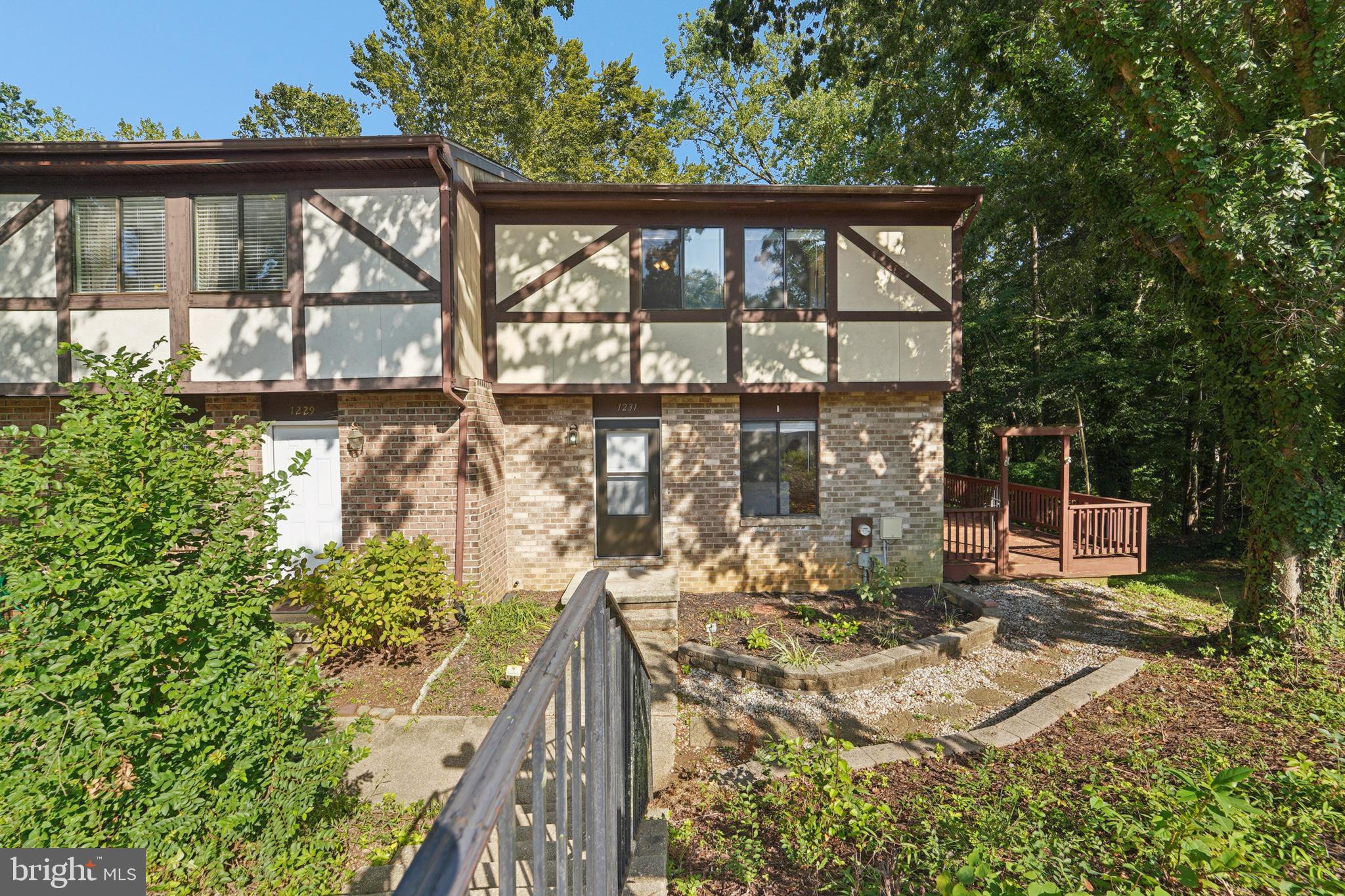 Welcome 1231 Summerwood Ct! Beautifully maintained townhome tucked away in the serene, wooded community of Kimberly Woods. Perfect for entertaining or simply unwinding, the expansive two-sided deck offers a tranquil outdoor retreat. Inside, the bright and updated kitchen boasts white cabinetry, granite countertops, and a stylish tile backsplash—an ideal space for any home chef. Two new atrium doors open to the deck, filling the main level with natural light and creating a seamless flow between indoor and outdoor living.
Upstairs, you’ll find three spacious bedrooms, including an upgraded generous primary suite with a walk-in closet and private en suite bath. The fully finished lower level adds even more versatility with a cozy family room, full bath, laundry, storage, and walkout access to the backyard—perfect for gatherings or quiet relaxation.
Recent upgrades include a newly installed heat pump for added comfort and efficiency. Located in the heart of Arnold, this home combines the charm of small-town living with convenient access to major destinations—just 6.4 miles from Annapolis, 26 miles south of Baltimore, and 35 miles east of Washington, D.C.