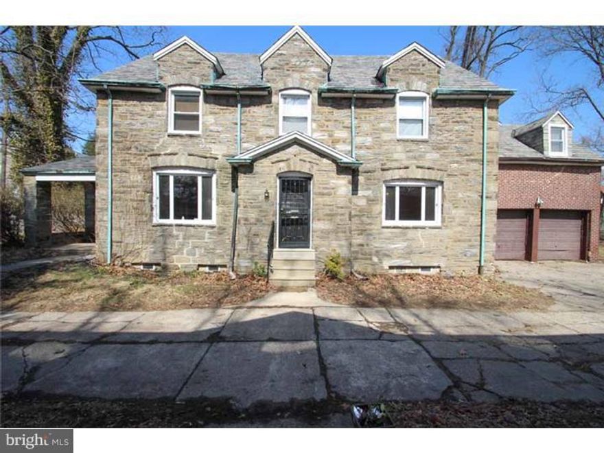 PRICED TO SELL! DO NOT MISS this beautiful Stone Colonial home in wonderful East Oak Lane! Property consists of four large bedrooms, three full and one half bath, and a finished basement! Hardwood floors, updated kitchen with granite counter tops and stainless steel appliances and a beautiful center staircase complete the first floor along with the living room, dining room and breakfast nook! Four large bedrooms upstairs and three baths, including an updated master bath. Do not miss the finished basement and bar area great for entertaining! Plenty of outdoor space both in front and rear of property along with a long driveway. There is also a porch with stone arches! The detail is not to be overlooked in this magnificent home! Schedule your showing before it's too late!